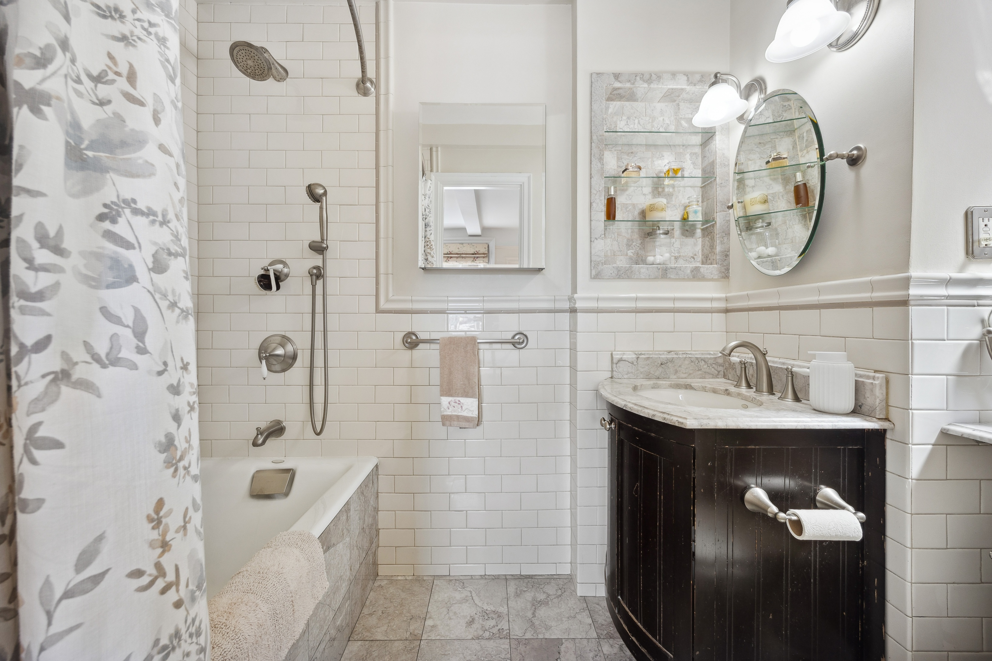 40 West 77th Street, Unit 8C Manhattan, NY 10024 - Photo 14 of 21 a bathroom with a sink a toilet and shower