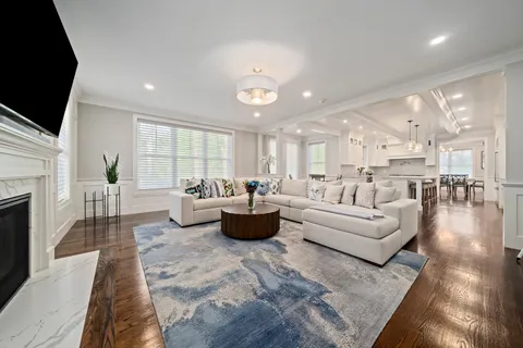 a view of a livingroom with furniture and window