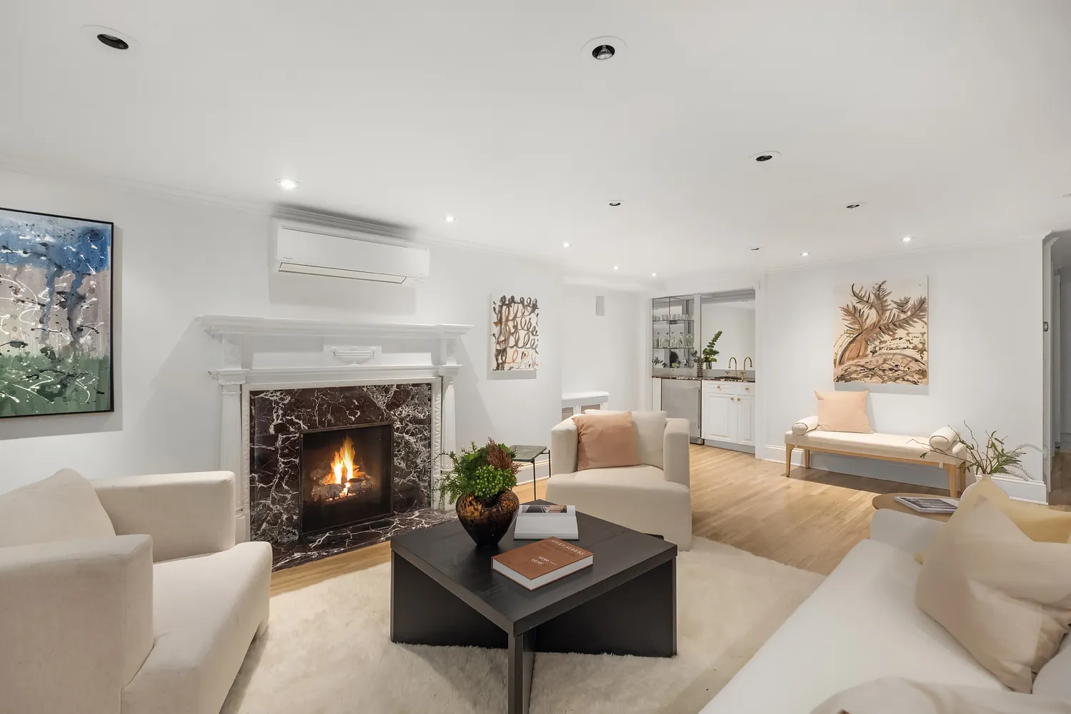 a living room with furniture and window