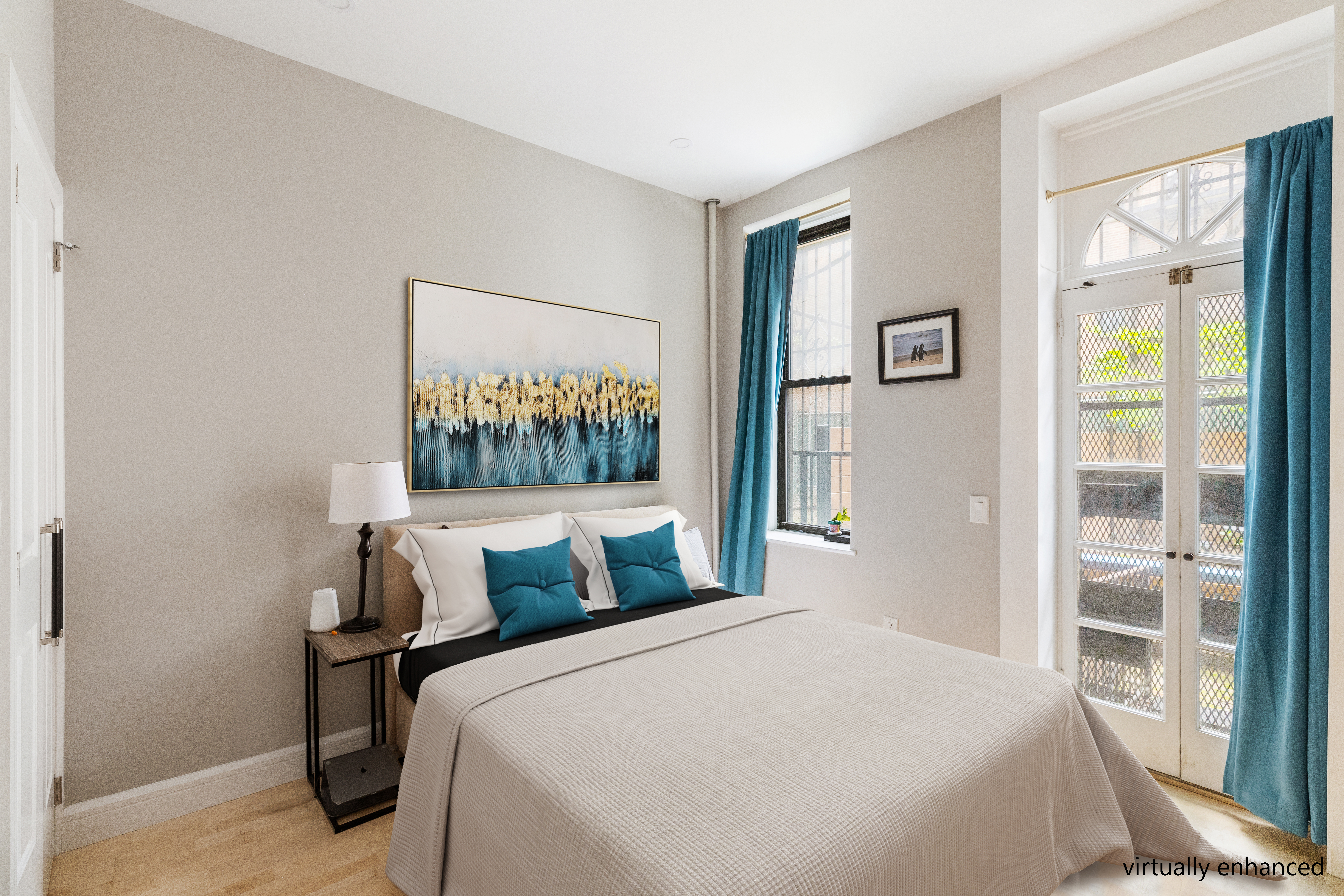 330 East 94th Street, Unit 1AB Manhattan, NY 10128 - Photo 5 of 14 a bedroom with a bed and glass window