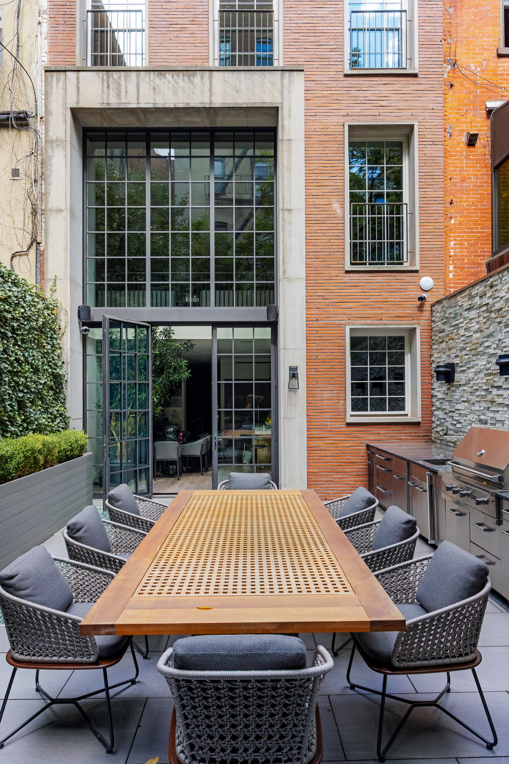 146 Waverly Place Manhattan, NY 10014 - Photo 16 of 41 a view of a patio with a table and chairs
