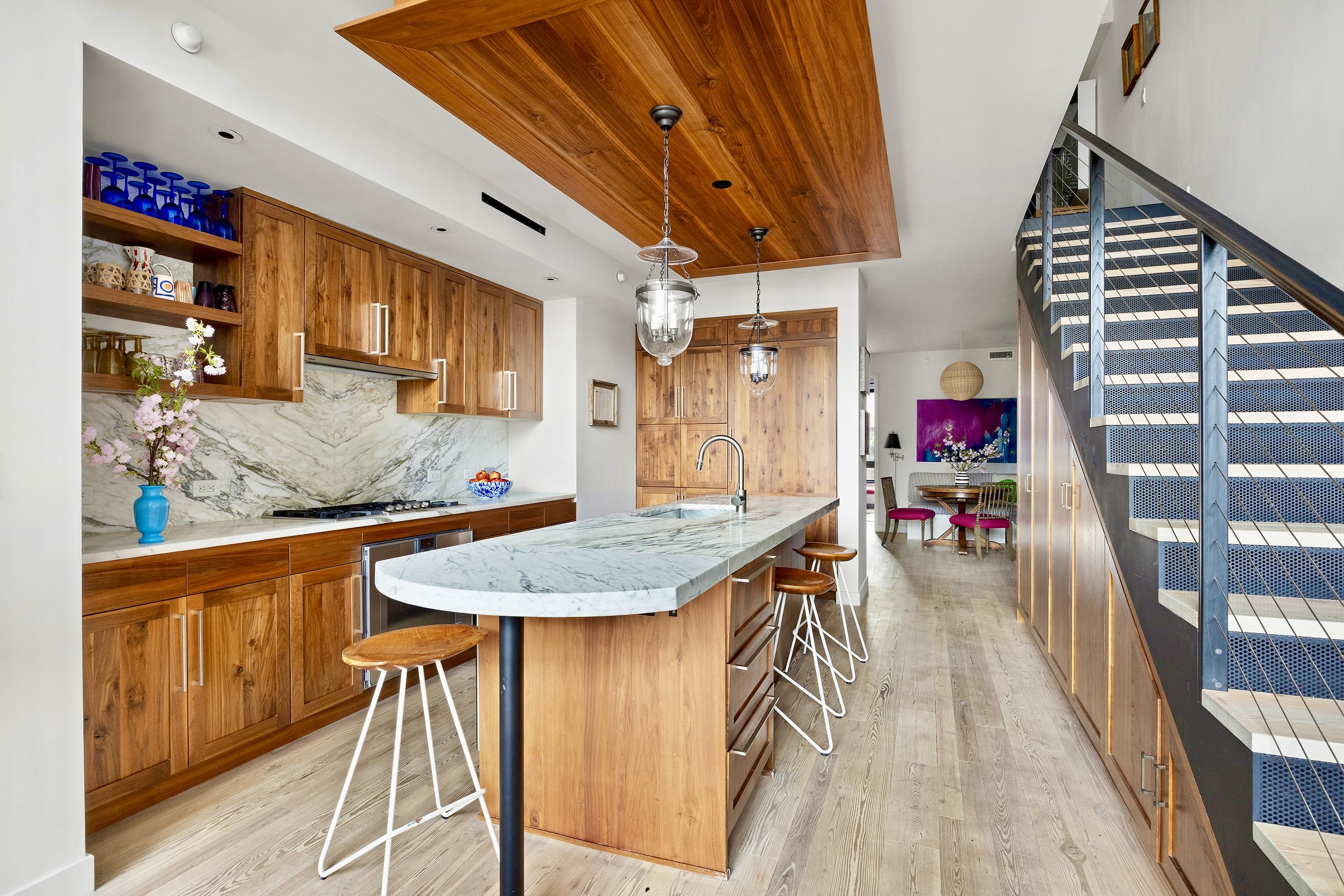 90 Furman Street, Unit N510 Brooklyn, NY 11201 - Photo 12 of 31 a dining hall with stainless steel appliances granite countertop a kitchen island a stove and a wooden floors