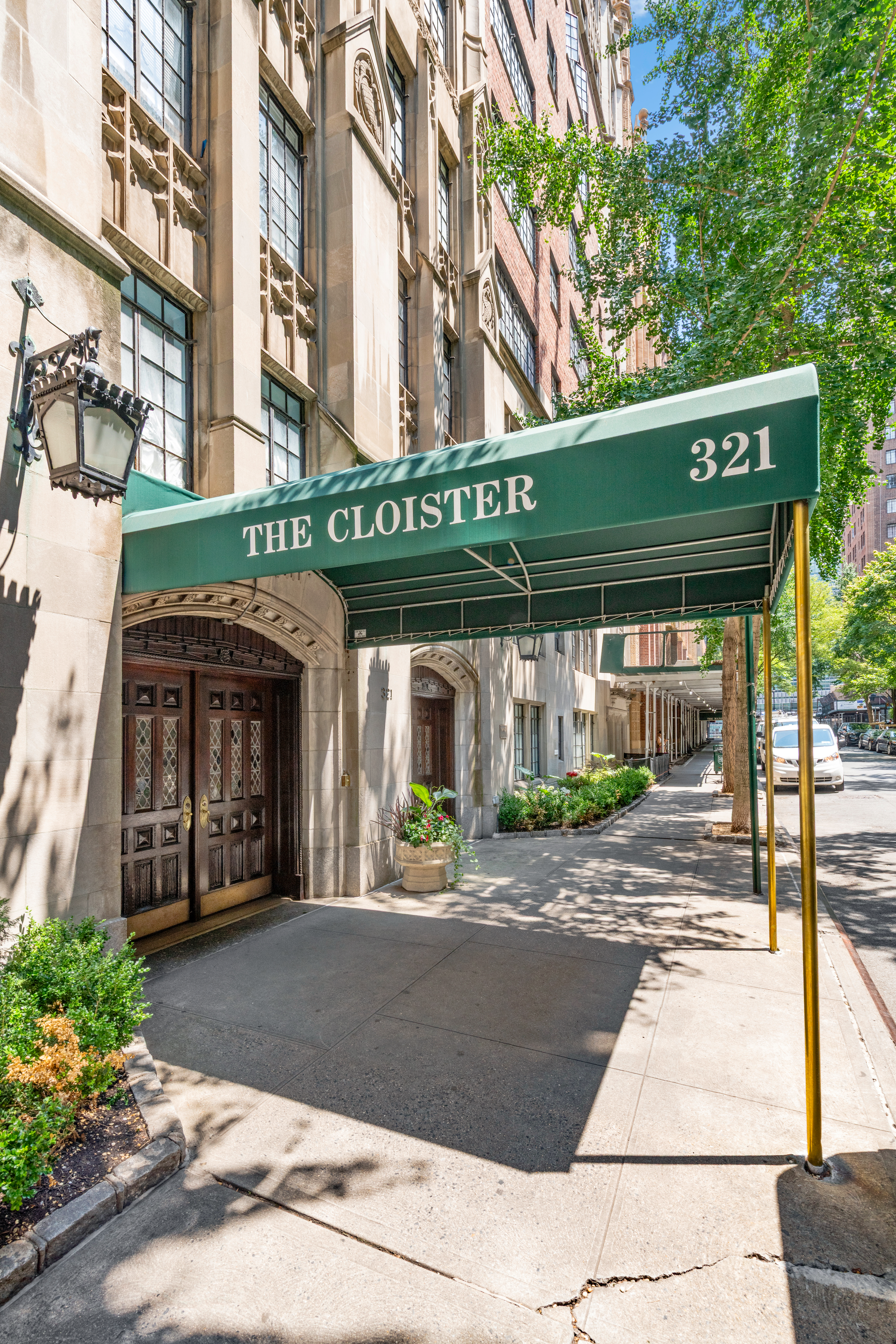 321 East 43rd Street, Unit 510 Manhattan, NY 10017 - Photo 5 of 8 a front view of a building with a garden