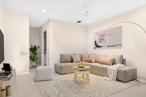 a living room with furniture and a couch