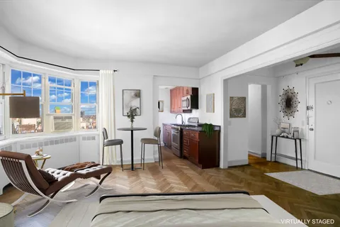 a living room with furniture and a table