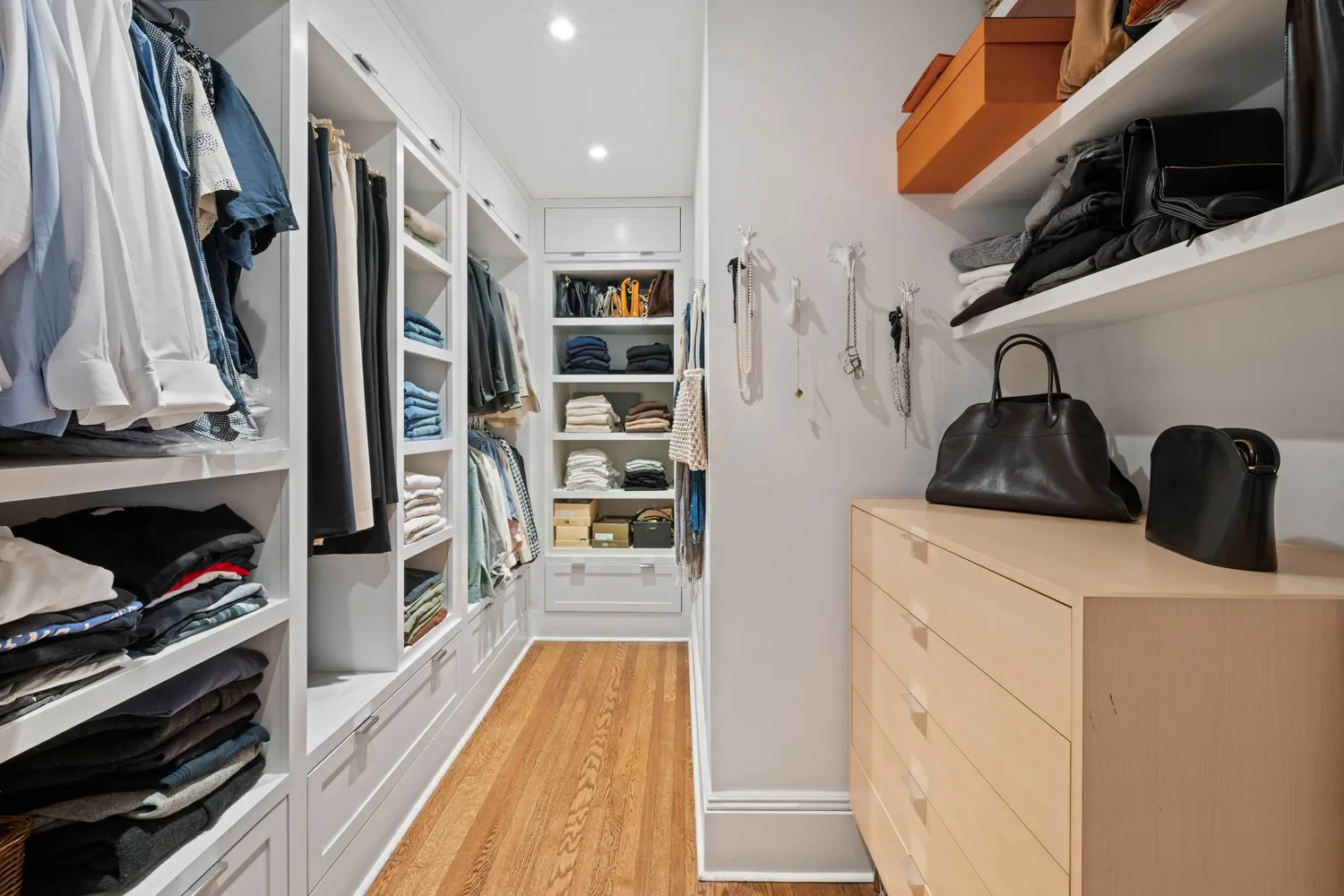 a kitchen with stainless steel appliances a refrigerator and a stove