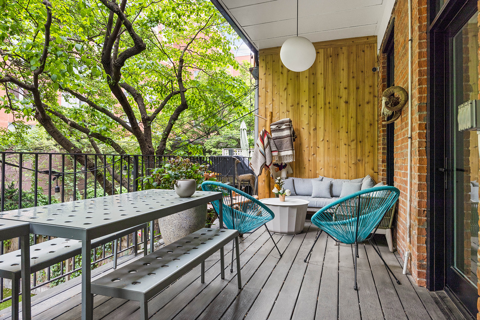 298 State Street, Unit TRIPLEX Brooklyn, NY 11201 - Photo 20 of 21 a view of balcony with two chairs and wooden floor