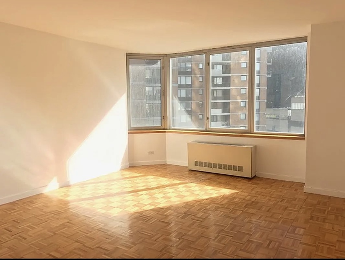 500 West 43rd Street, Unit 4E Manhattan, NY 10036 - Photo 1 of 11 a view of an empty room and window