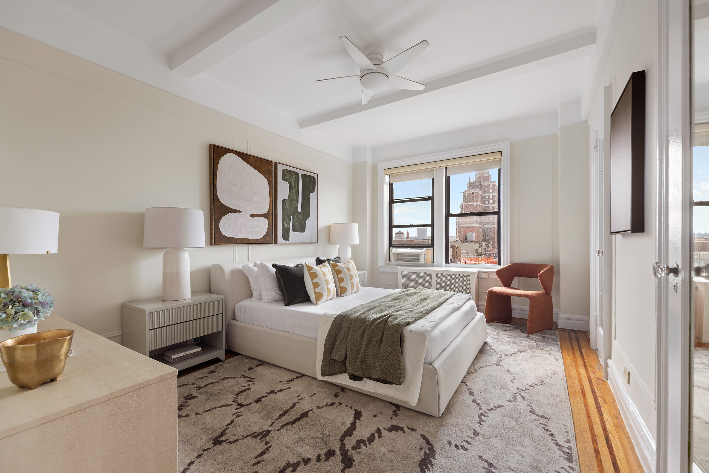 710 West End Avenue, Unit 9A Manhattan, NY 10025 - Photo 6 of 8 a bedroom with a bed and wooden floor