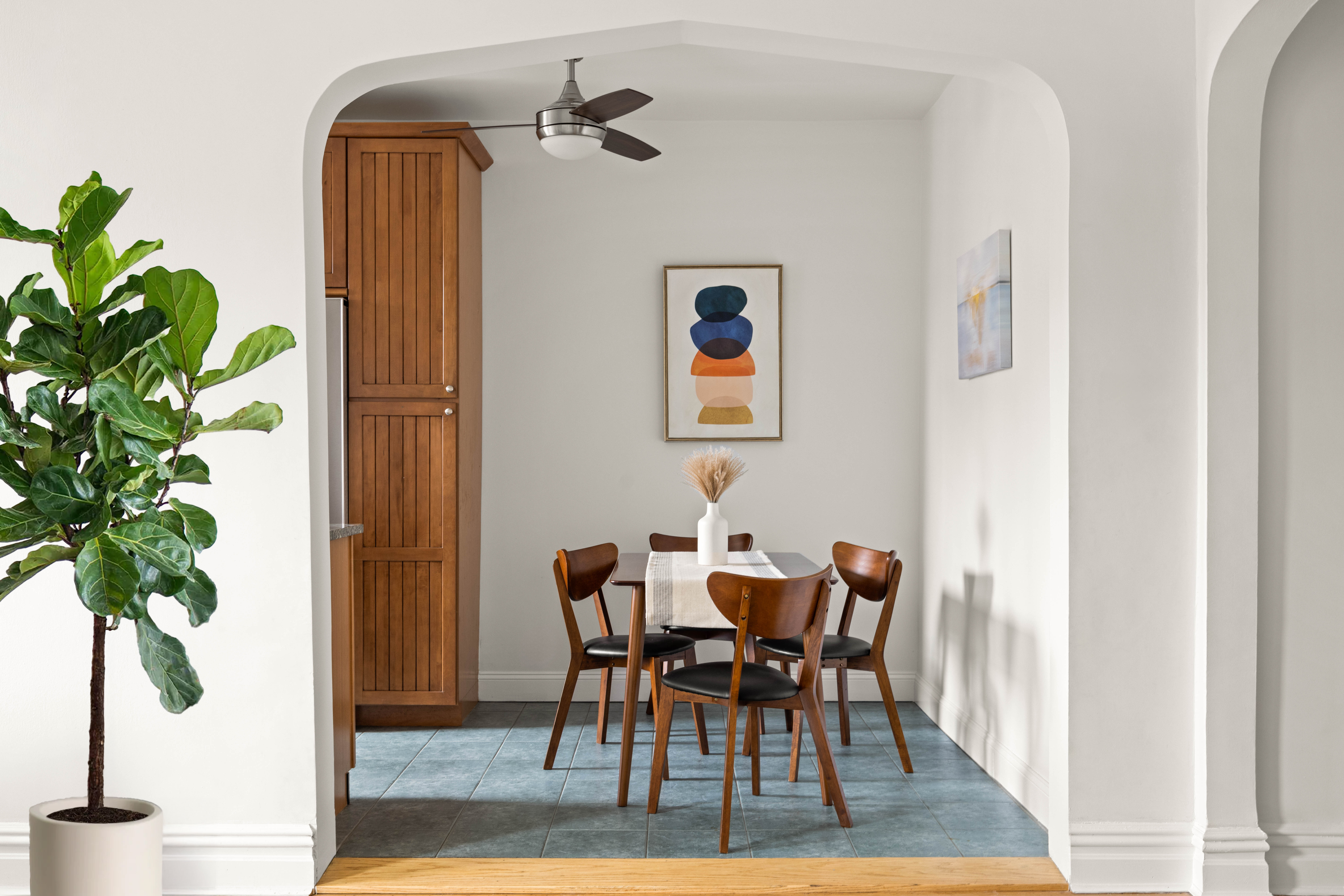 30 Ocean Parkway, Unit 6G Brooklyn, NY 11218 - Photo 6 of 18 a view of a dining room with furniture and a potted plant