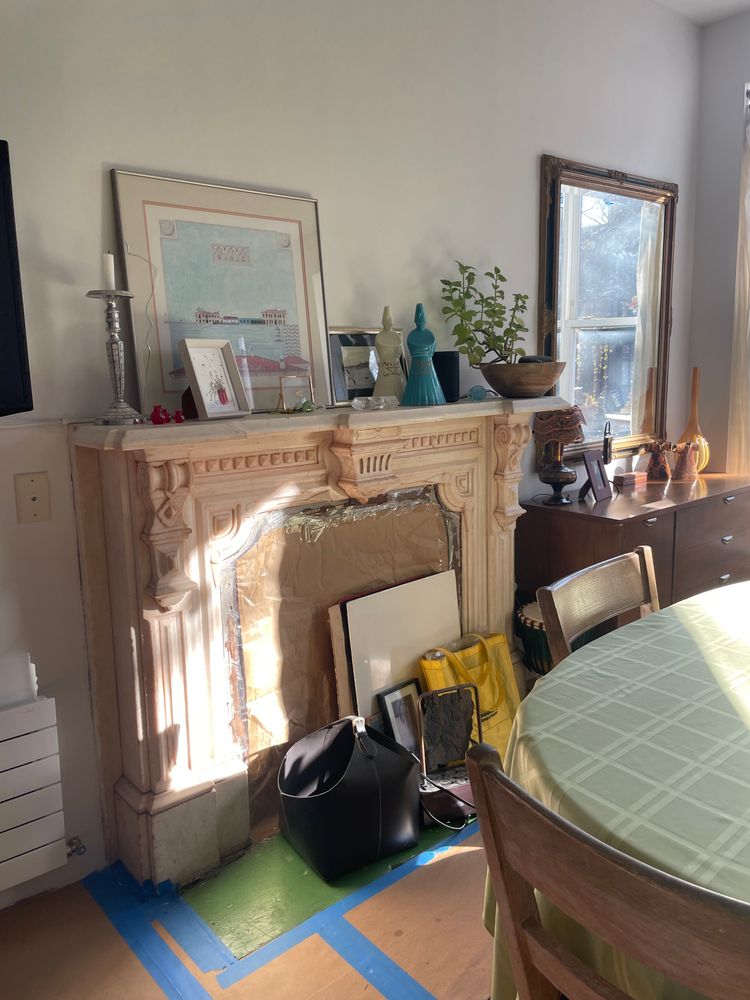 a view of a dining room with furniture and window