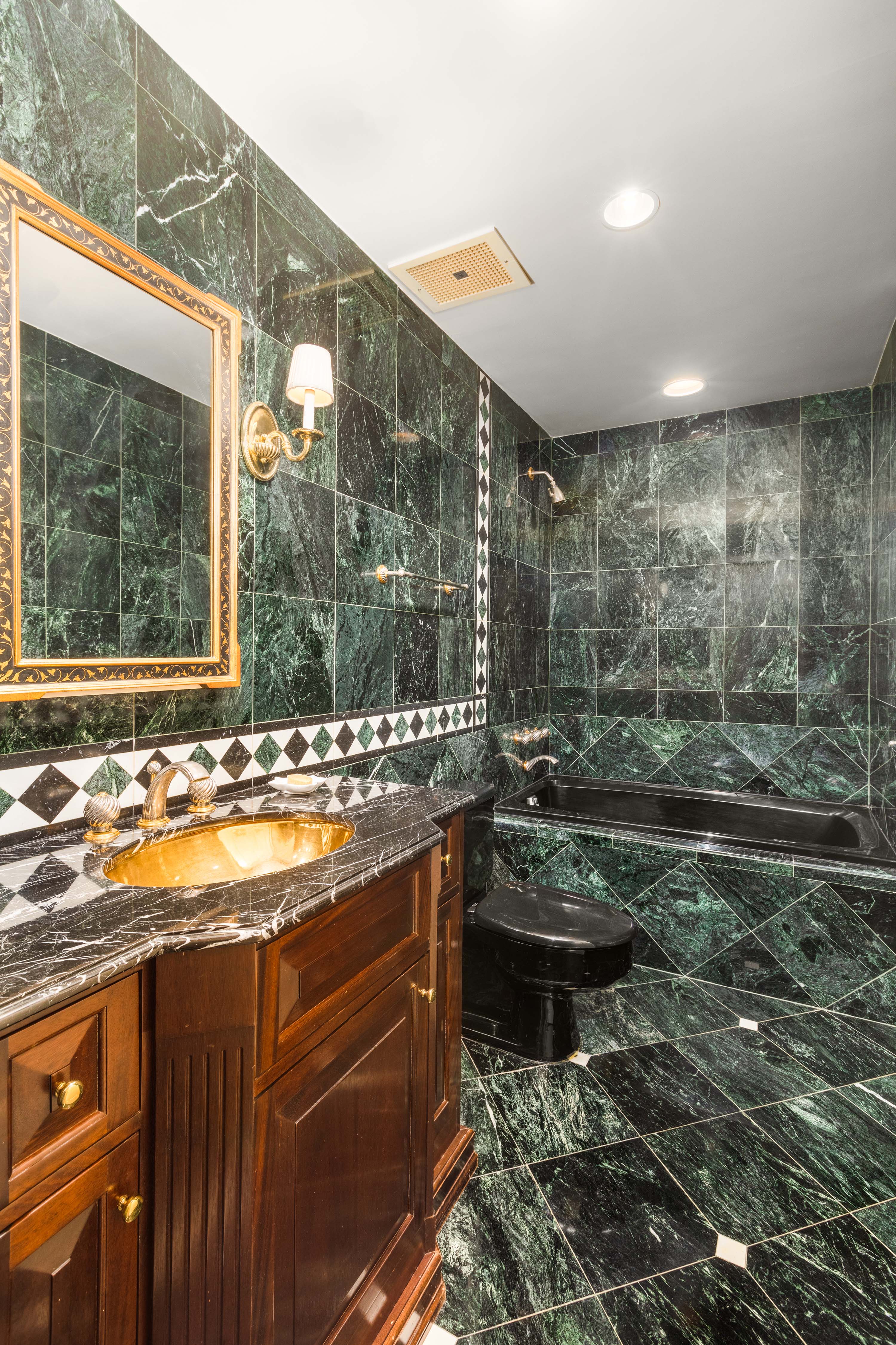 2 East End Avenue, Unit PHG Manhattan, NY 10075 - Photo 12 of 15 a bathroom with a granite countertop sink a toilet and shower