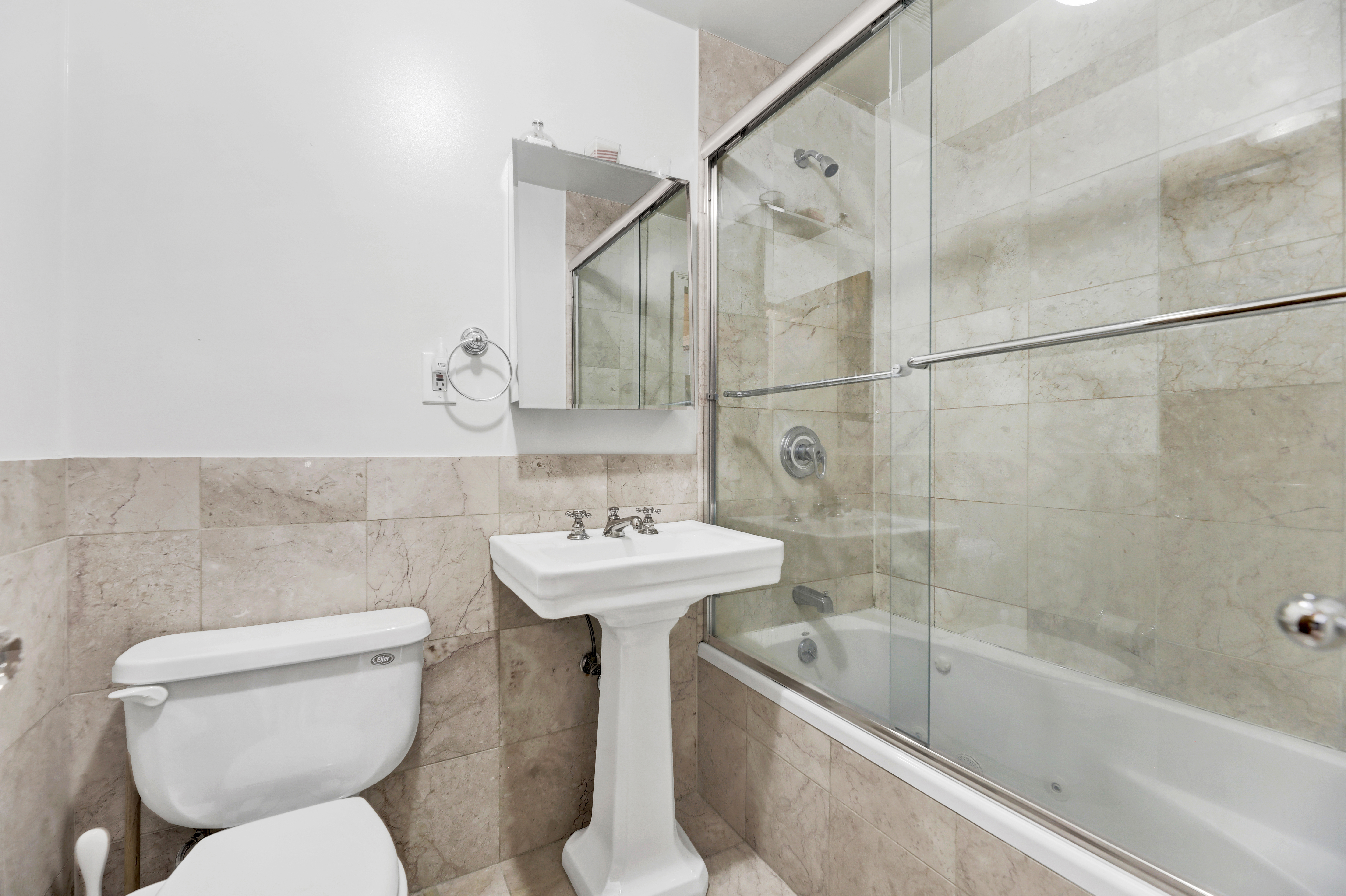 36 Russell Street, Unit 22 Brooklyn, NY 11222 - Photo 23 of 27 a bathroom with a sink toilet and shower