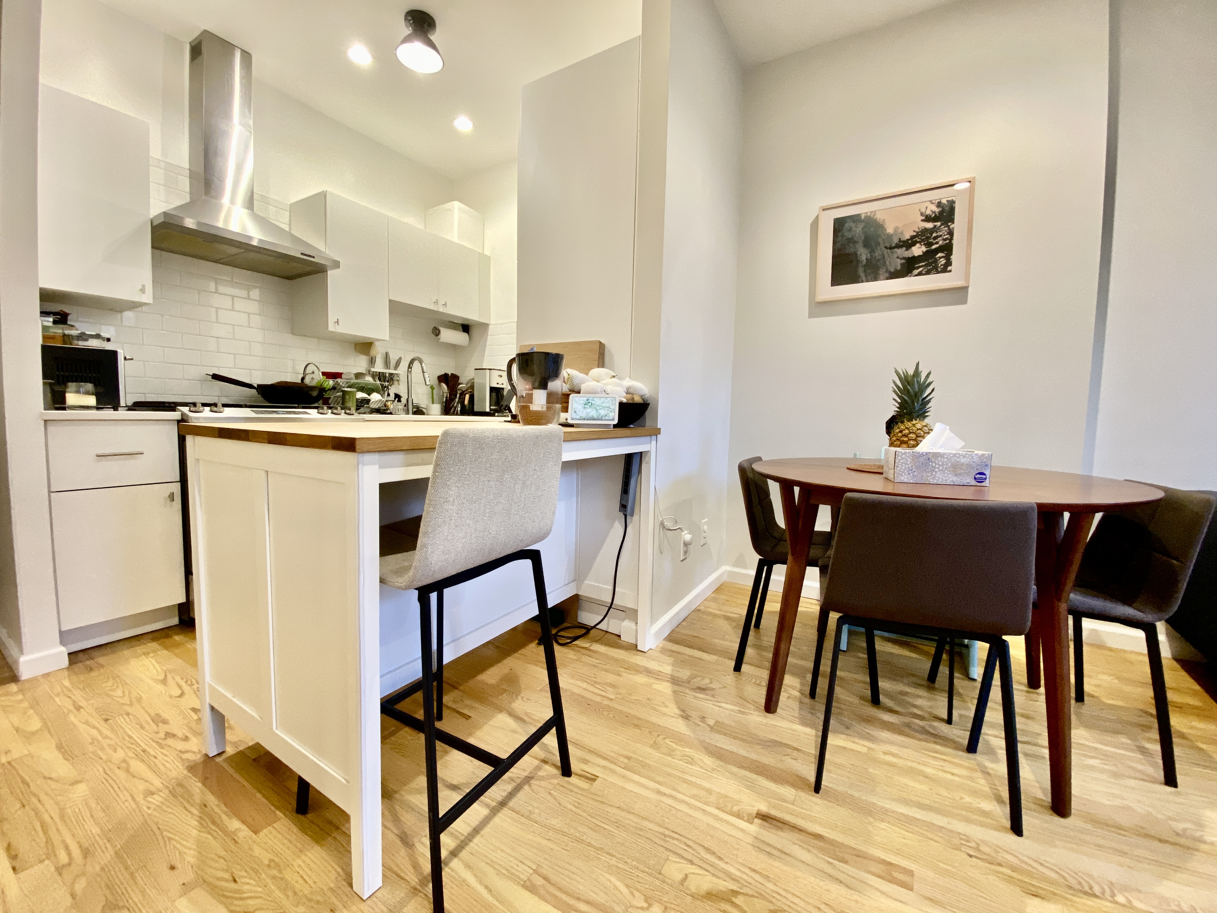 602 Madison Street, Unit 2 Brooklyn, NY 11221 - Photo 3 of 10 a view of a dining room with furniture and wooden floor