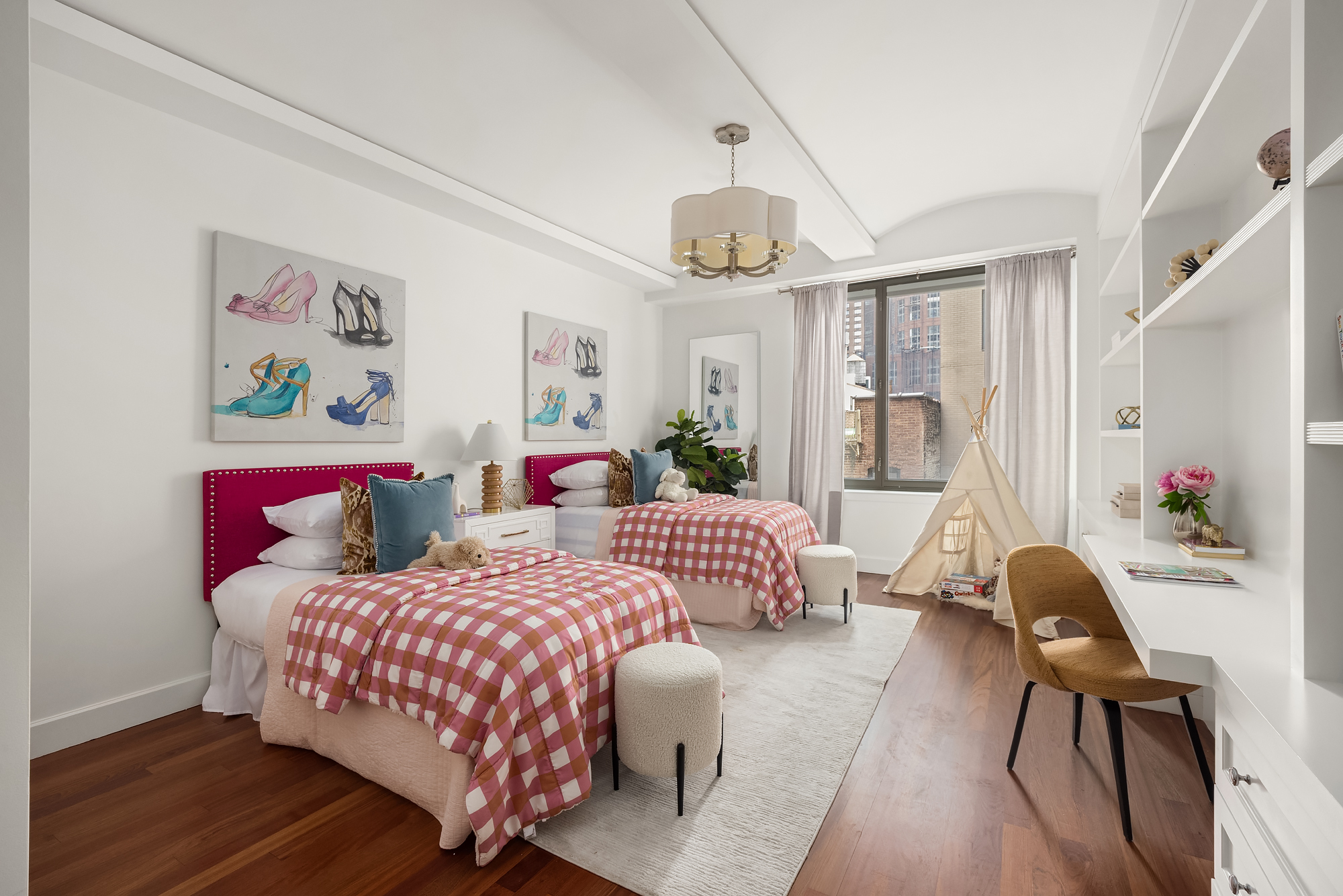 43 West 64th Street, Unit 7A Manhattan, NY 10023 - Photo 16 of 20 a bedroom with a bed and a chandelier