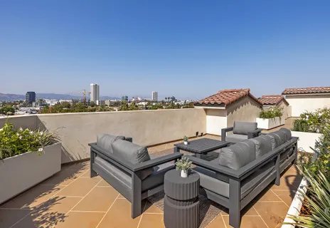 a view of a terrace with chairs