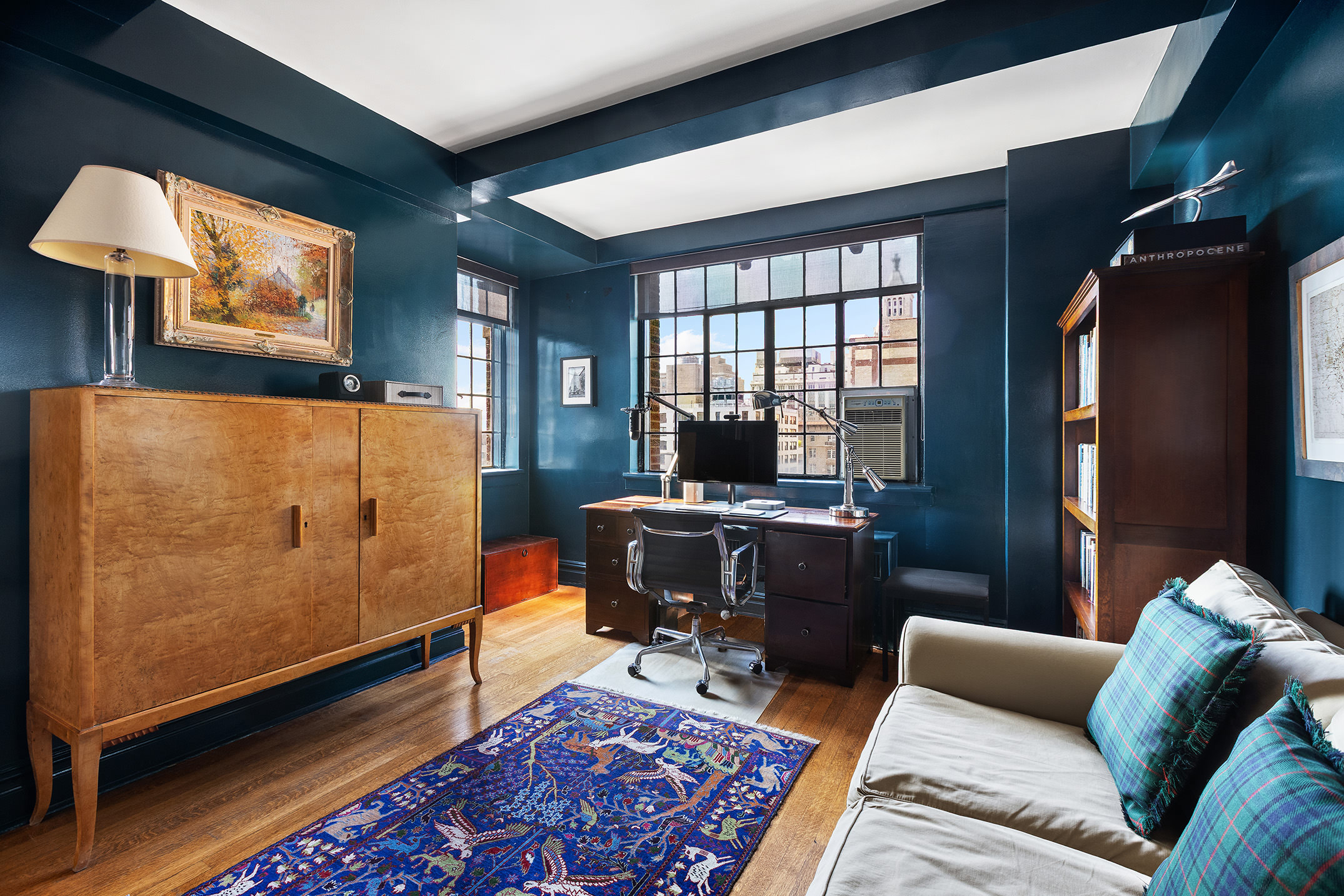 81 Irving Place, Unit 15DE Manhattan, NY 10003 - Photo 11 of 18 a livingroom with workspace and a window