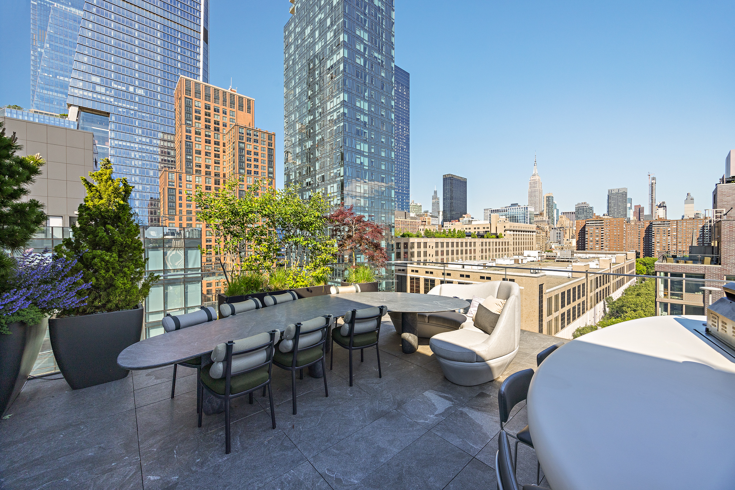 520 West 28th Street, Unit PH37 Manhattan, NY 10001 - Photo 24 of 45 a view of a chairs and table in the patio