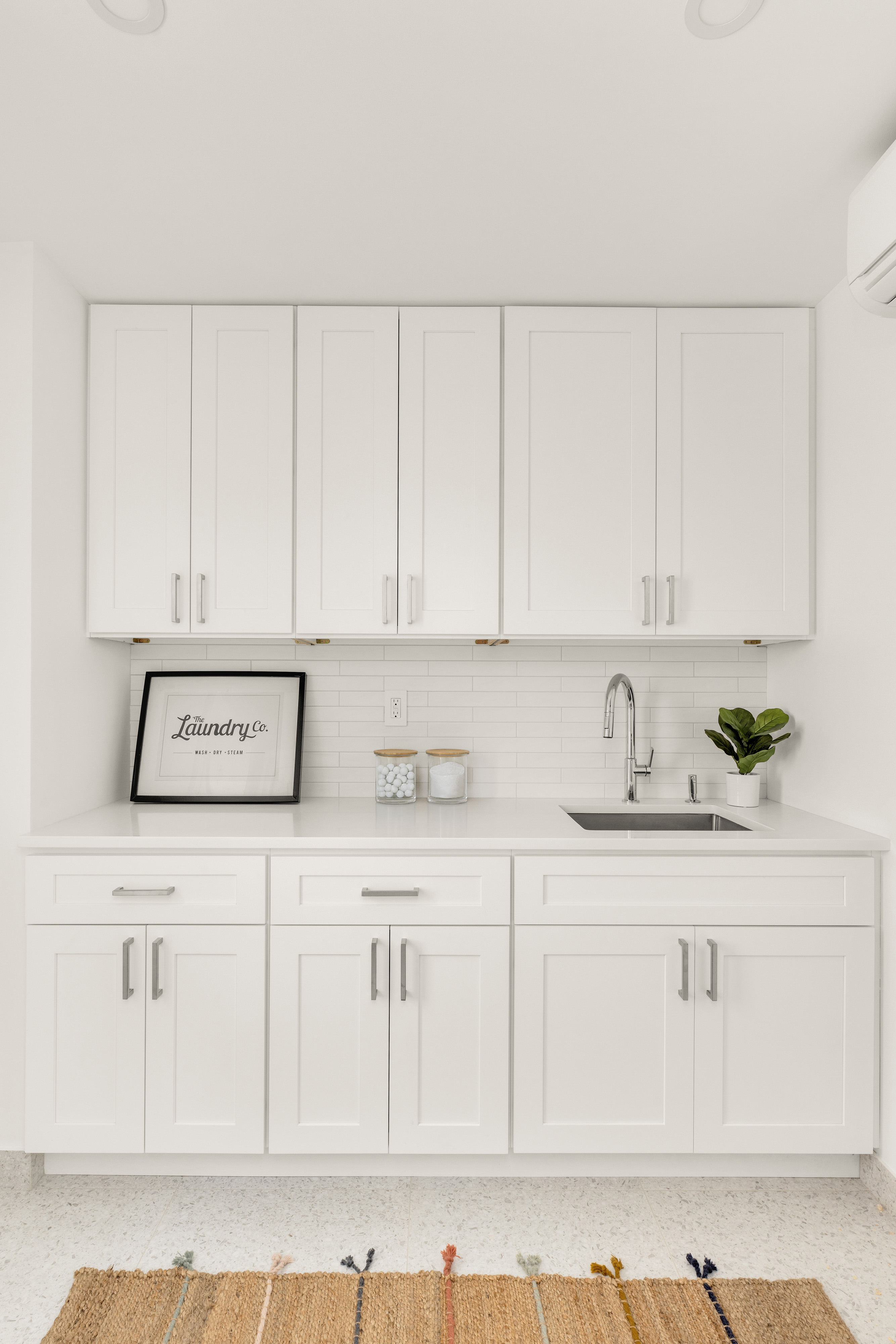 578 20th Street Brooklyn, NY 11218 - Photo 12 of 28 a kitchen with white cabinets