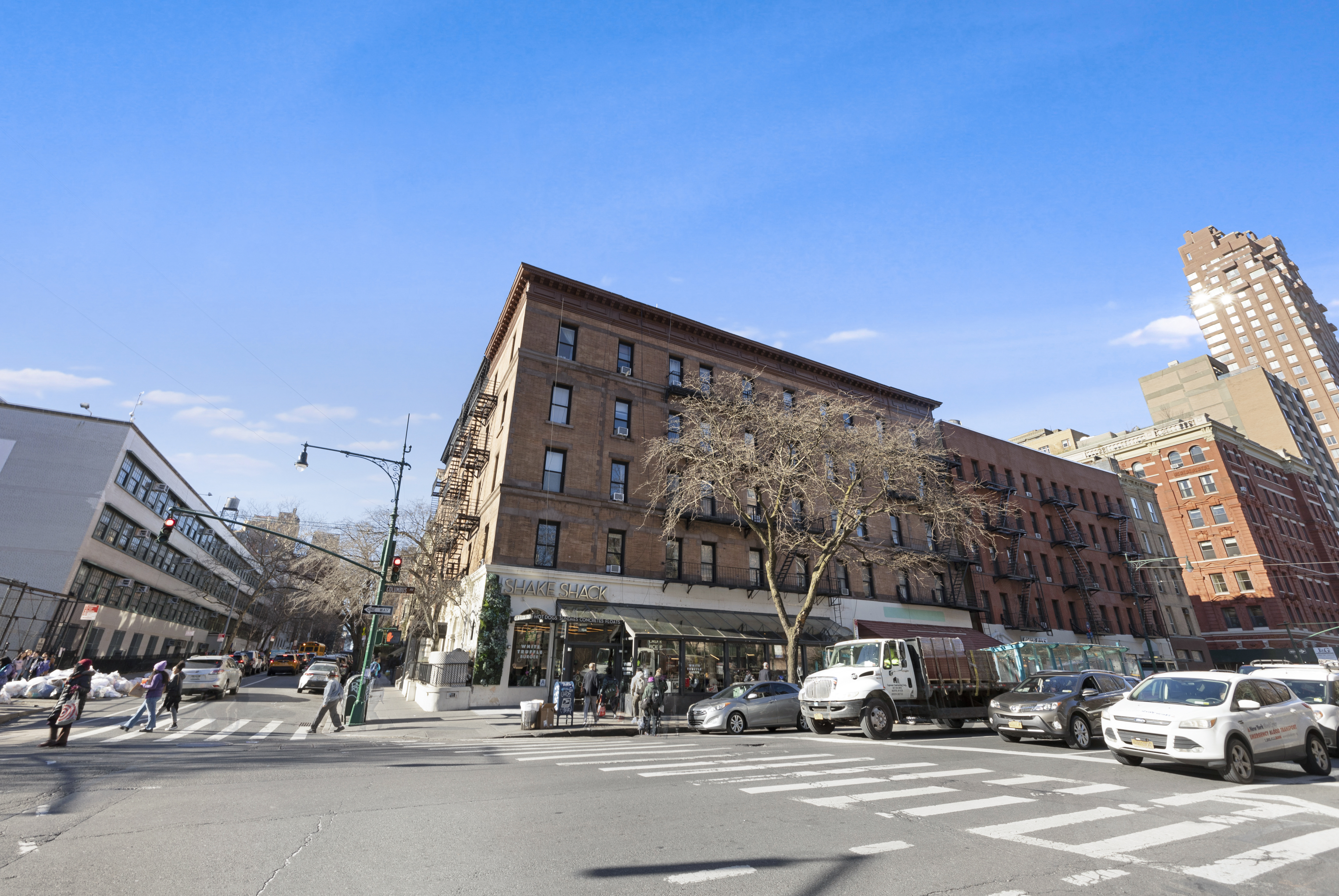 370 Columbus Avenue, Unit 5D Manhattan, NY 10024 - Photo 9 of 10 a view of a building and car parked