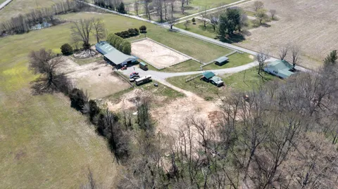 an aerial view of houses with outdoor space