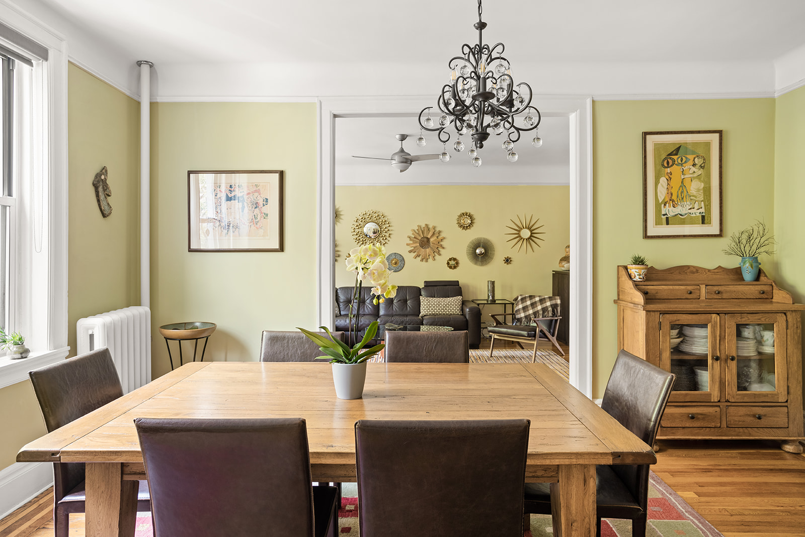 35-56 79th Street, Unit 22 Queens, NY 11372 - Photo 2 of 14 a view of a dining room with furniture window and wooden floor