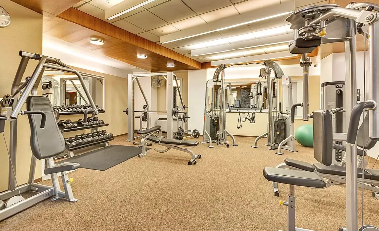 a view of a room with gym equipment