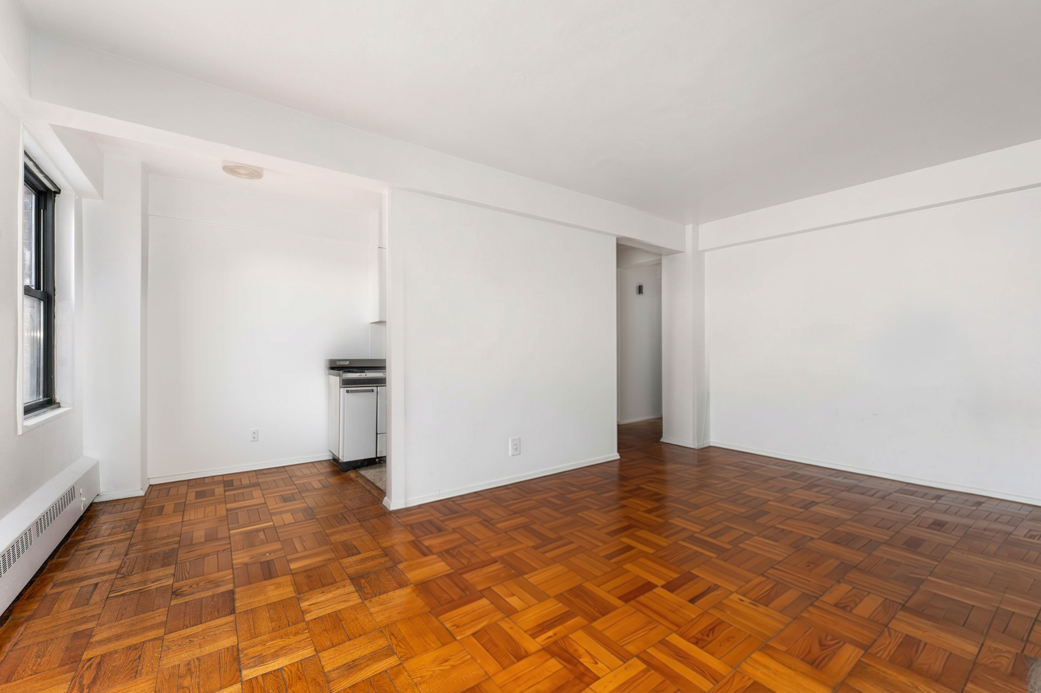 345 West 145th Street, Unit 5A1 Manhattan, NY 10032 - Photo 7 of 9 a view of an empty room