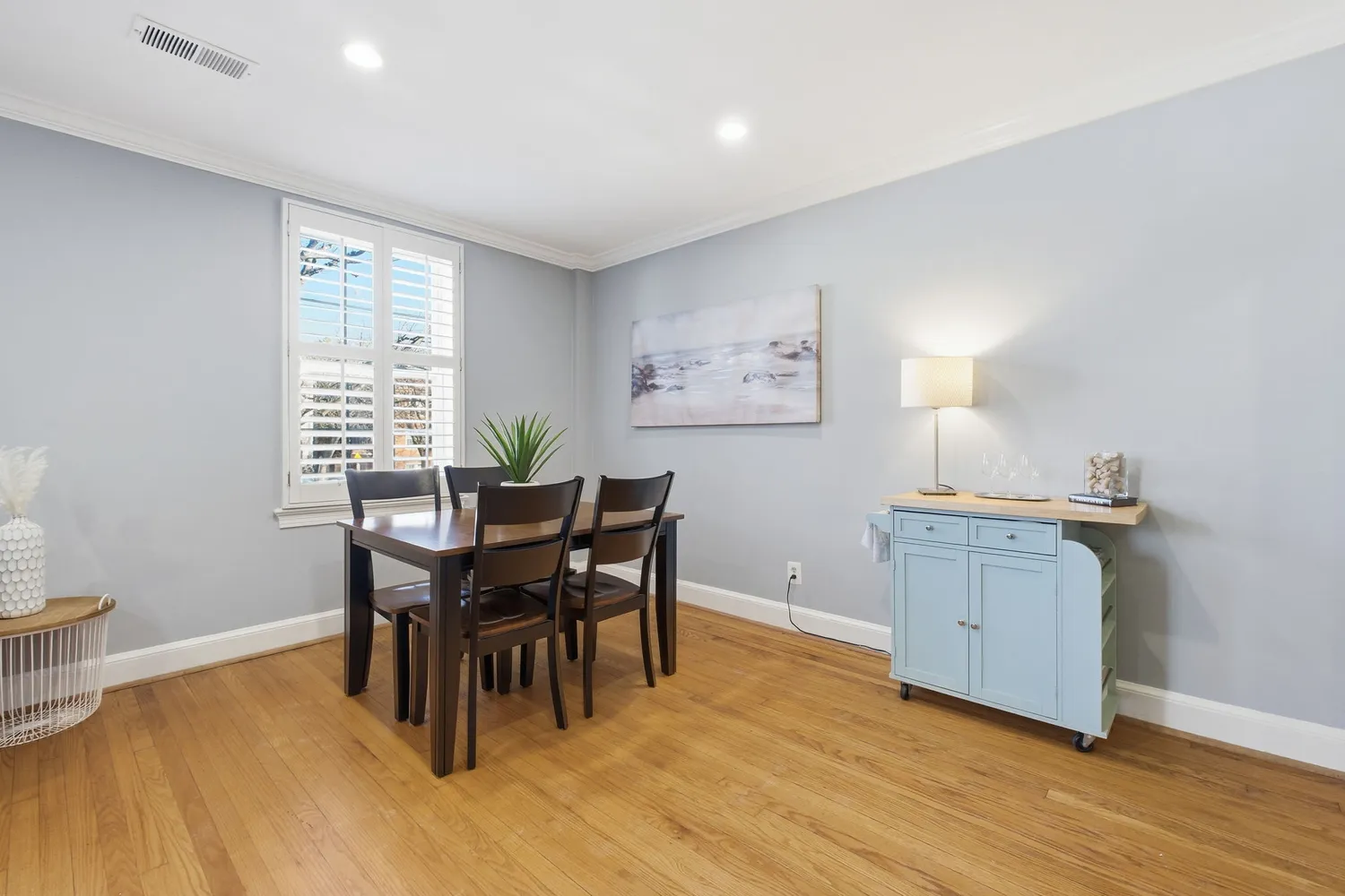 a workspace with furniture and wooden floor