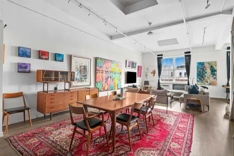 a view of a dining room with furniture