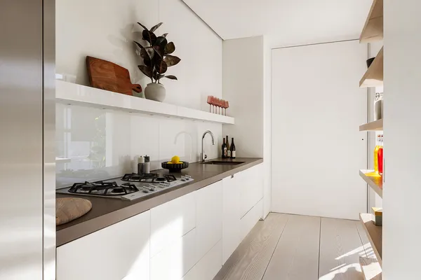 a kitchen with a sink and a stove