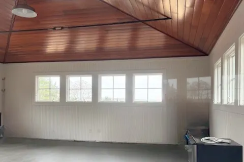 an empty room with windows