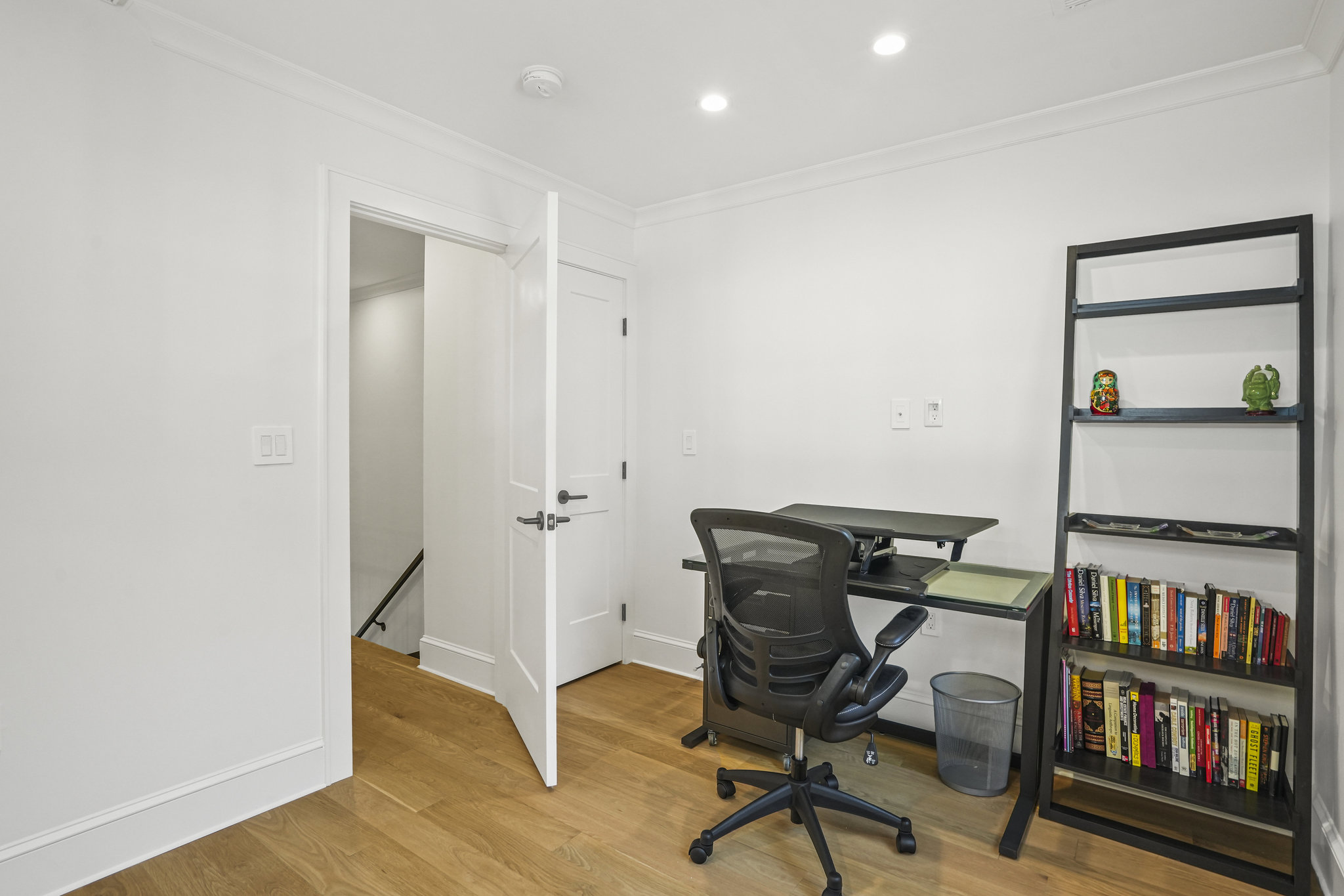 1920 35th Street Northwest Washington, DC 20007 - Photo 28 of 54 a view of a workspace with furniture and wooden floor