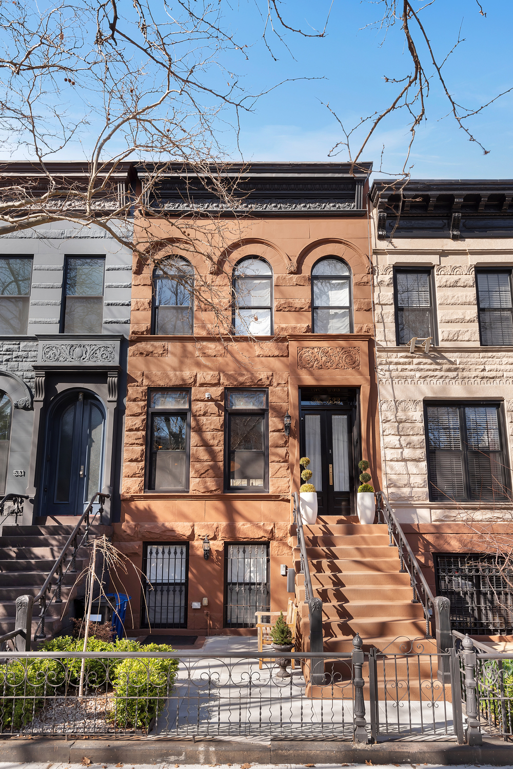 533 Decatur Street, Unit 1 Brooklyn, NY 11233 - Photo 19 of 20 a front view of a building with grey walls