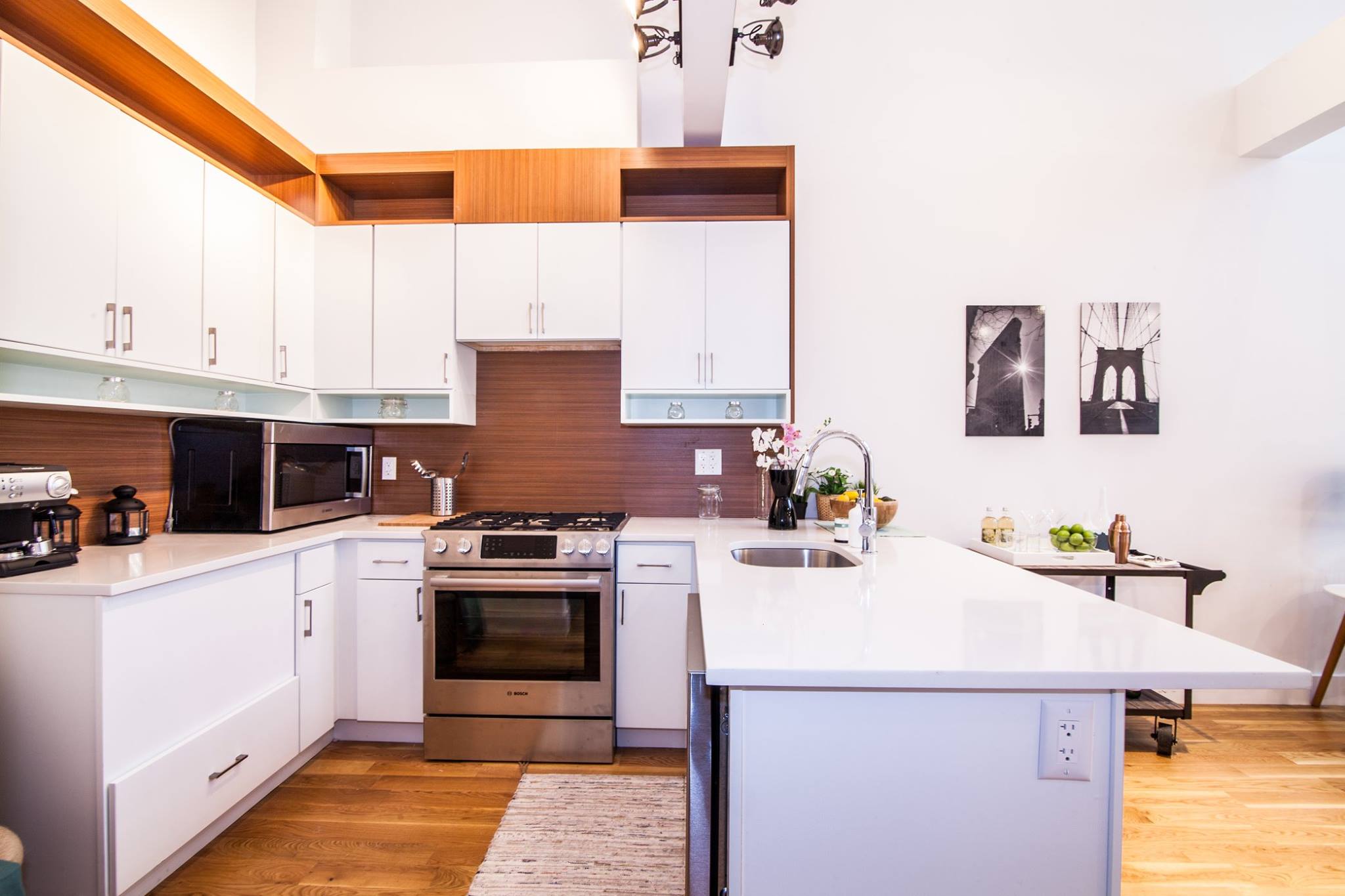 385 Jefferson Avenue, Unit C Brooklyn, NY 11221 - Photo 18 of 21 a kitchen with a sink stove and cabinets