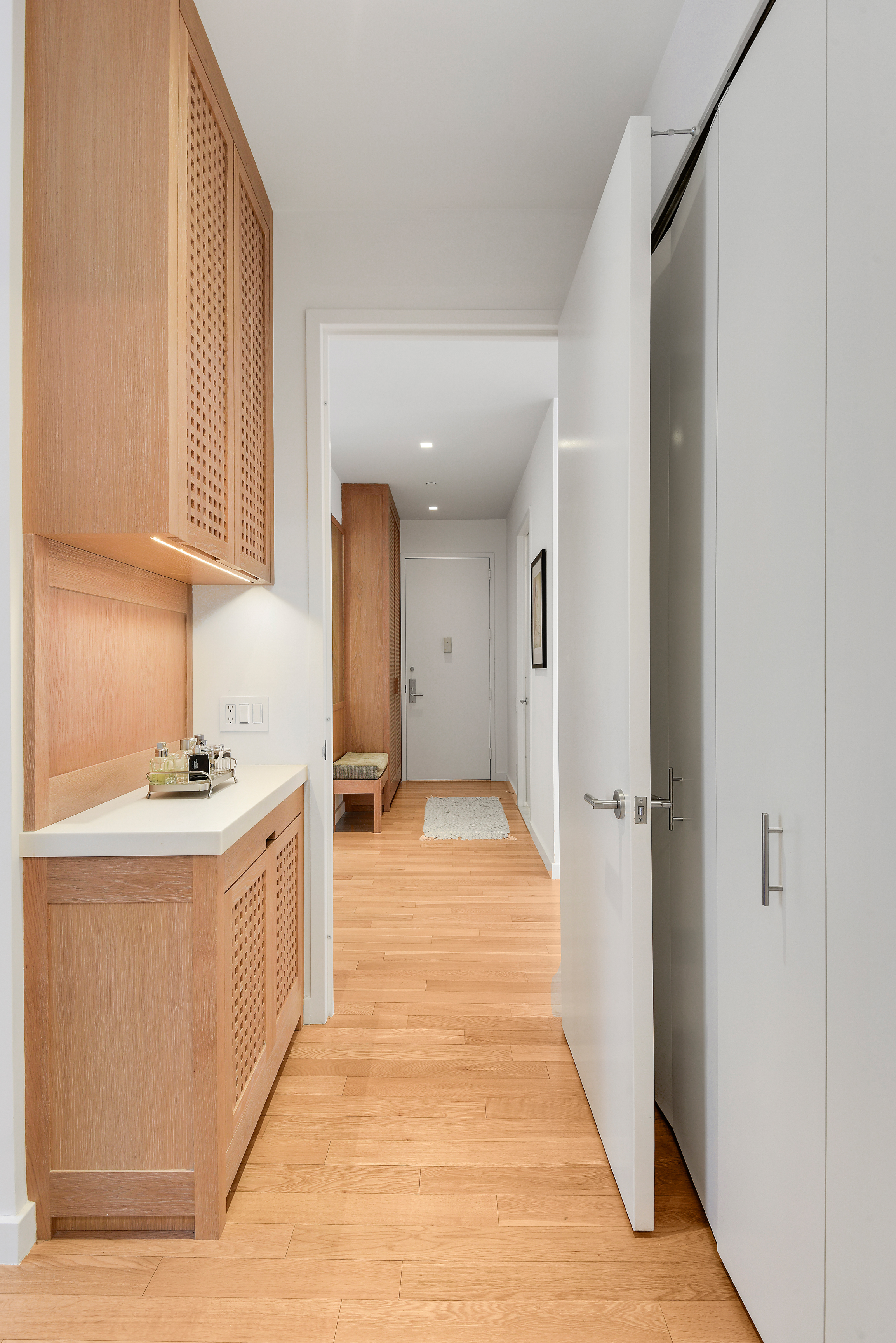 325 5th Avenue, Unit 16C Manhattan, NY 10016 - Photo 5 of 25 a view of a kitchen from the hallway