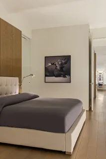 a living room with a bed and a couch