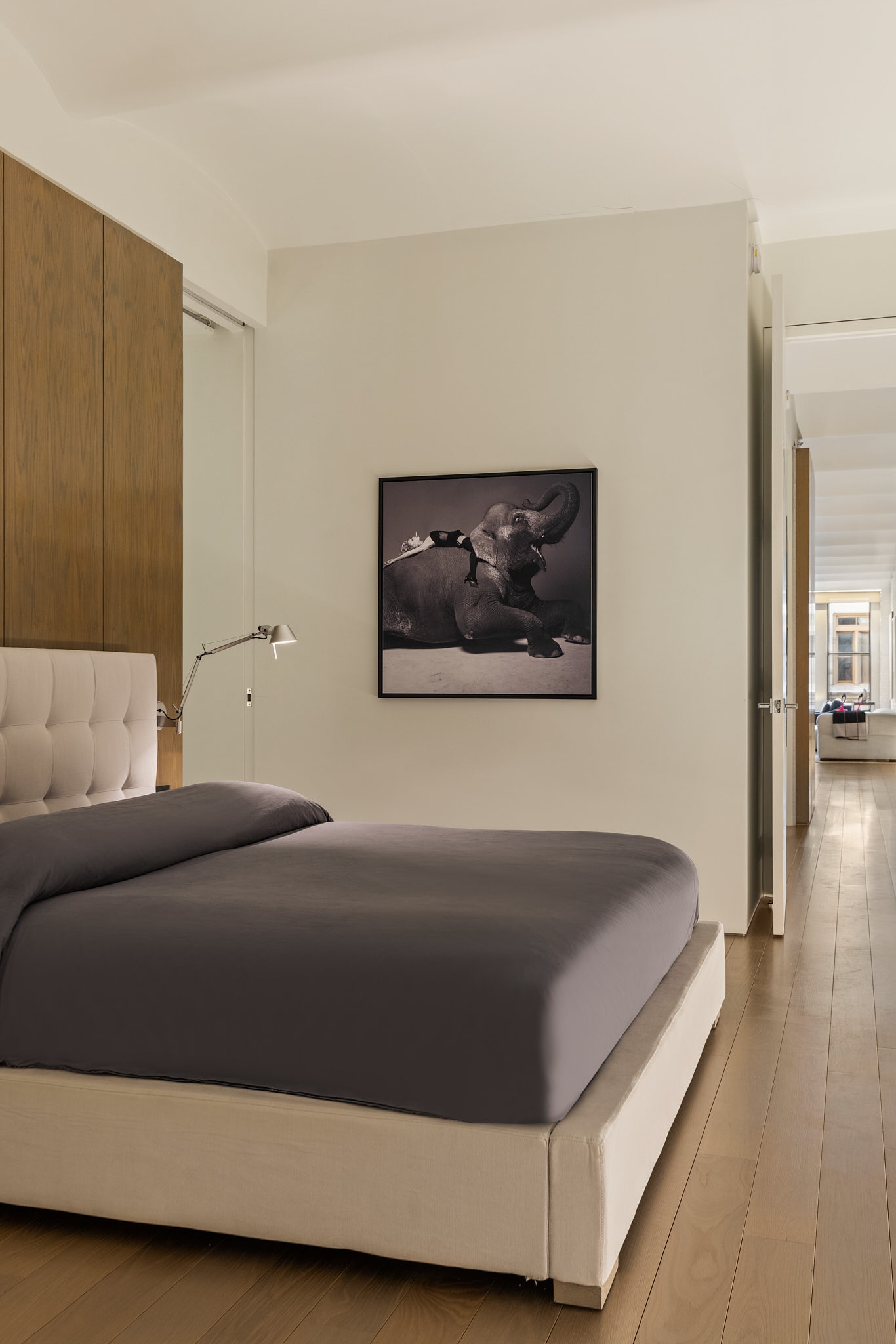 543 Broadway, Unit 6 Manhattan, NY 10012 - Photo 8 of 13 a living room with a bed and a couch