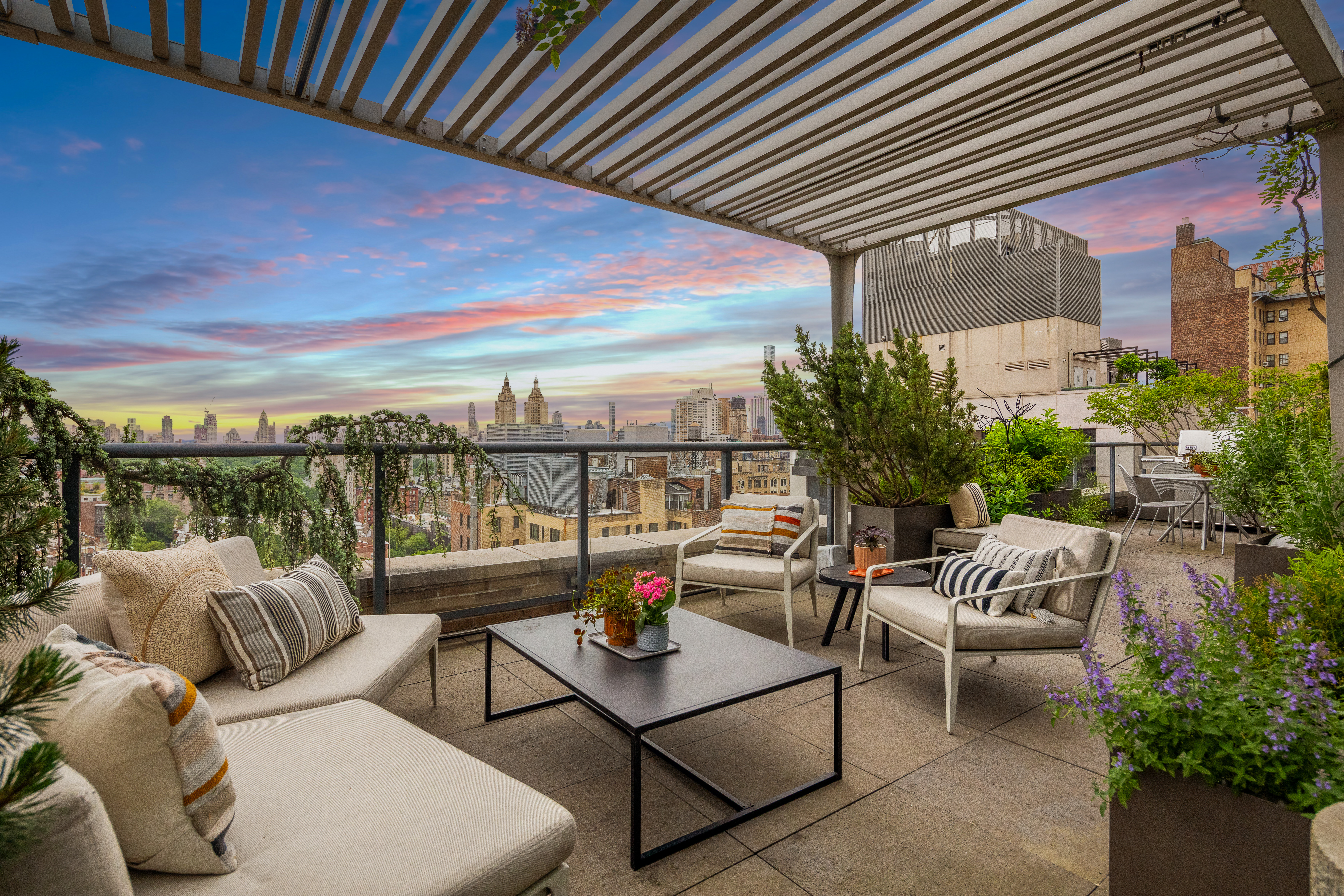 230 West 78th Street, Unit PH19 Manhattan, NY 10024 - Photo 13 of 17 a balcony with furniture and a potted plant
