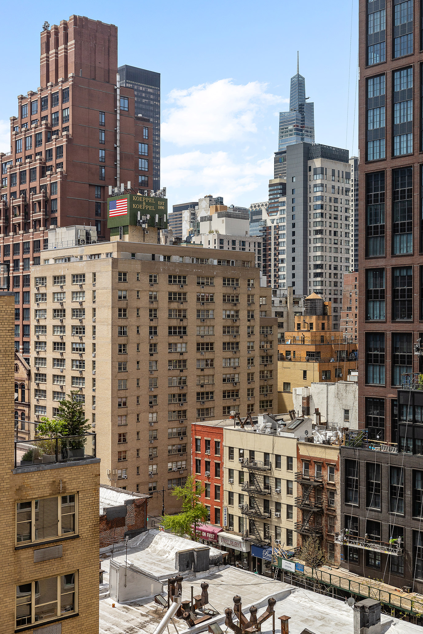 411 East 53rd Street, Unit 12D Manhattan, NY 10022 - Photo 14 of 15 a city view with tall buildings