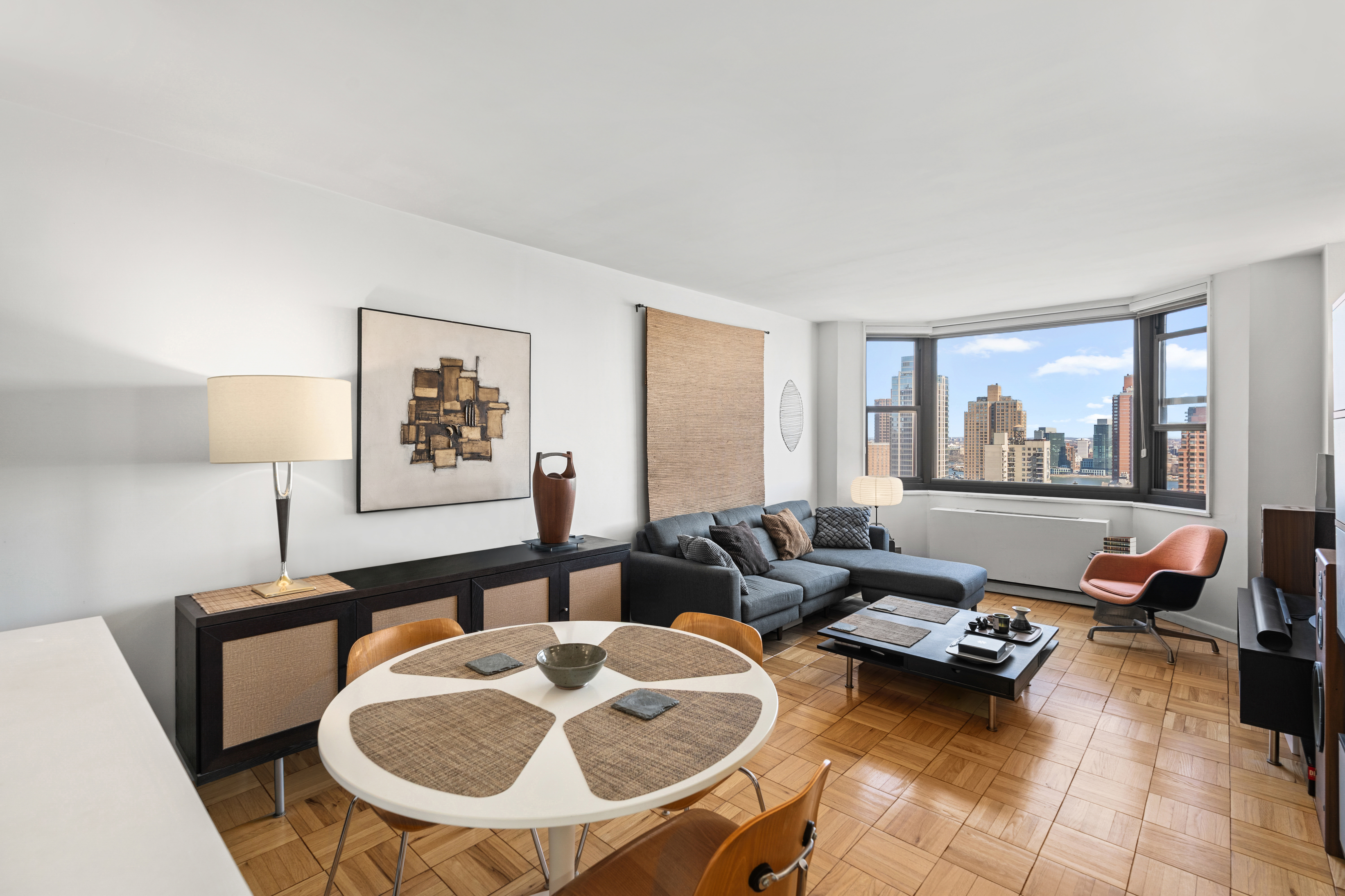 a living room with furniture and a window