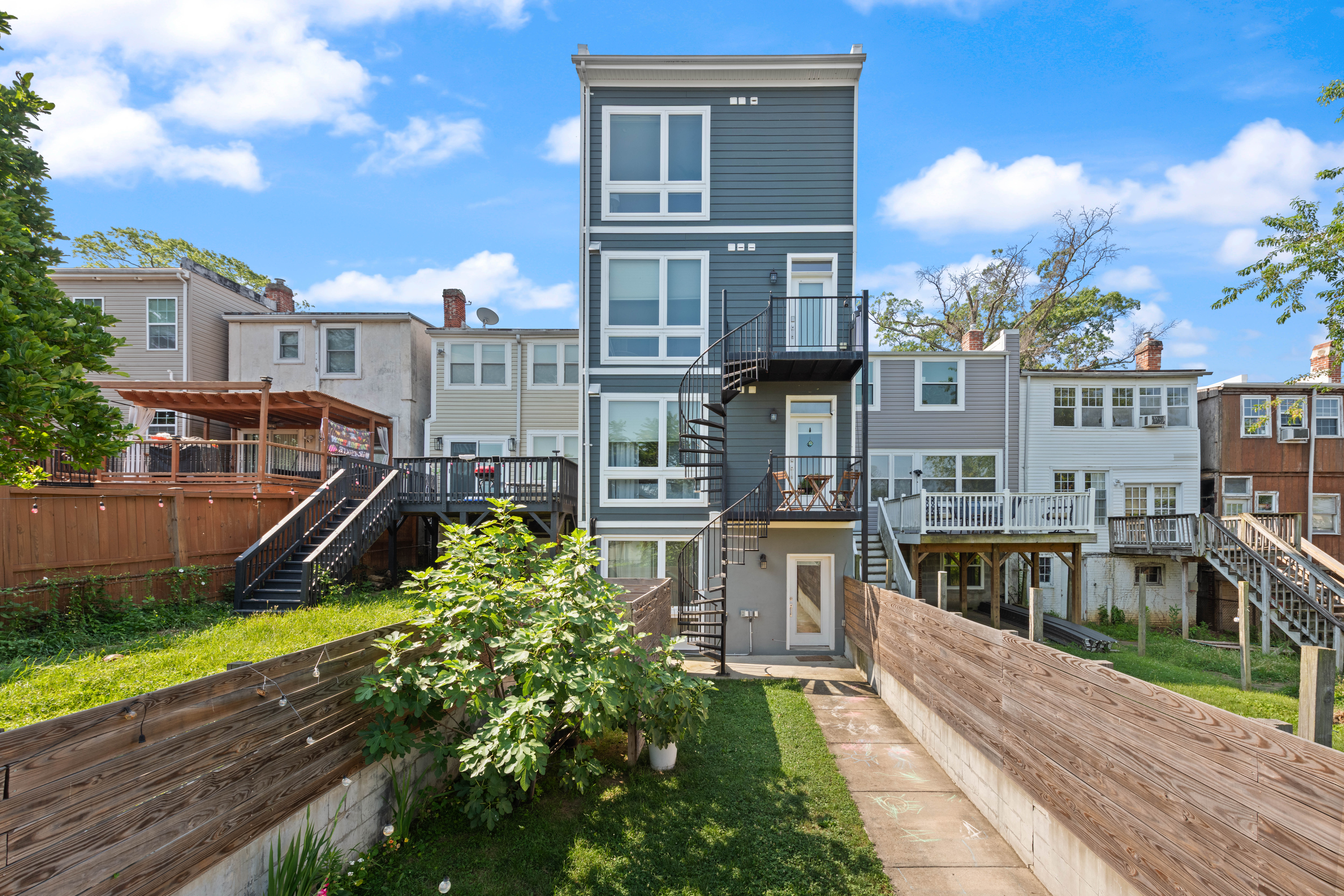 319 Varnum Street Northwest, Unit 3 Washington, DC 20011 - Photo 25 of 29 a front view of a house with a swimming pool