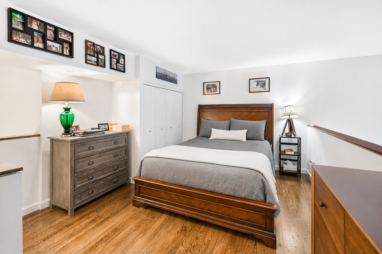 305 2nd Avenue, Unit 518 Manhattan, NY 10003 - Photo 10 of 19 a bedroom with a bed and a dresser