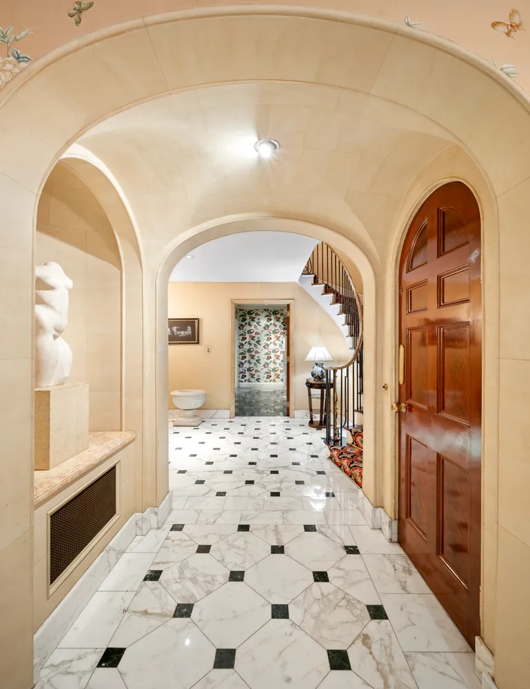 a bathroom with a granite countertop sink a mirror and shower