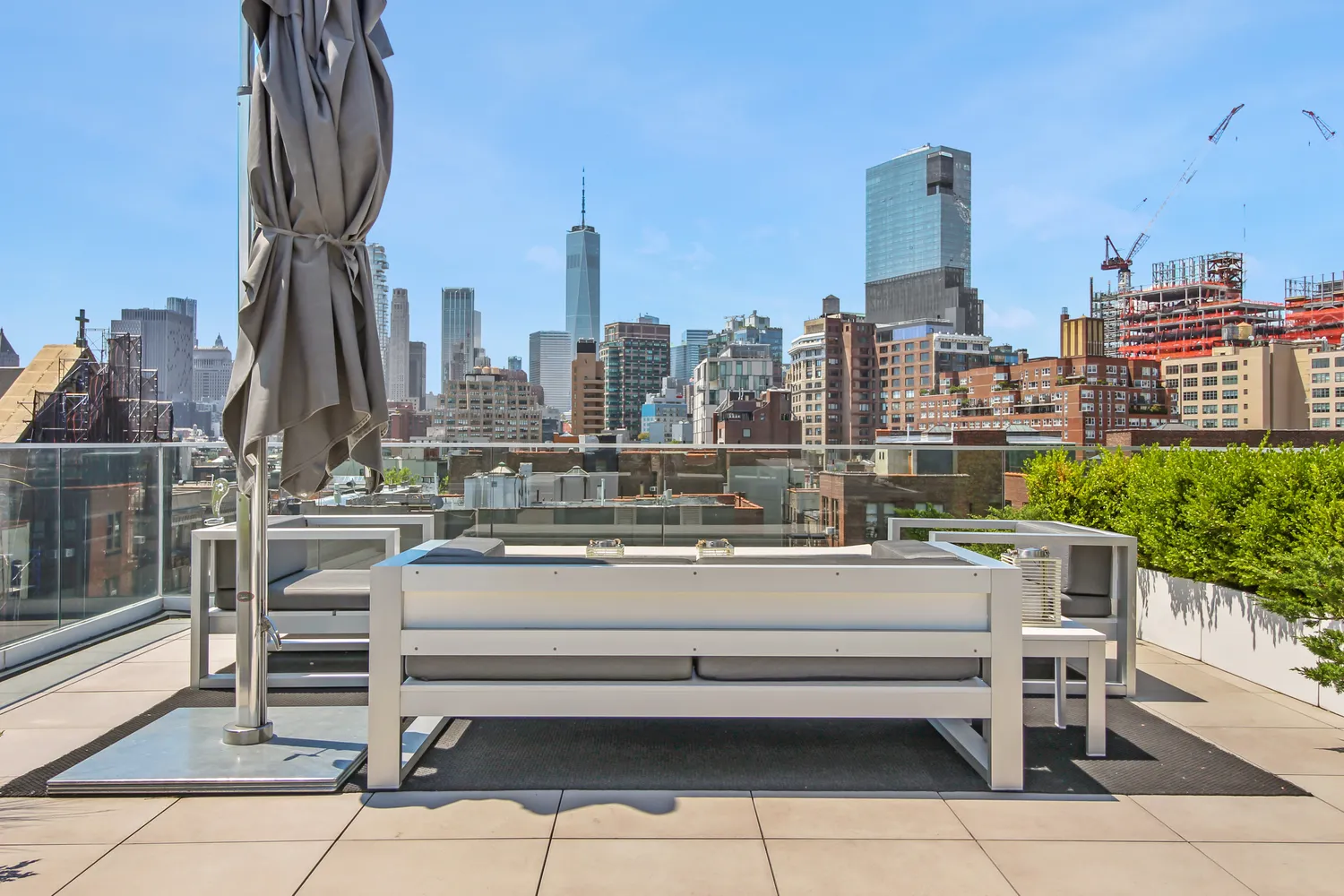 a view of a city with tall buildings