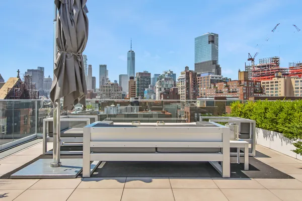 a view of a city with tall buildings