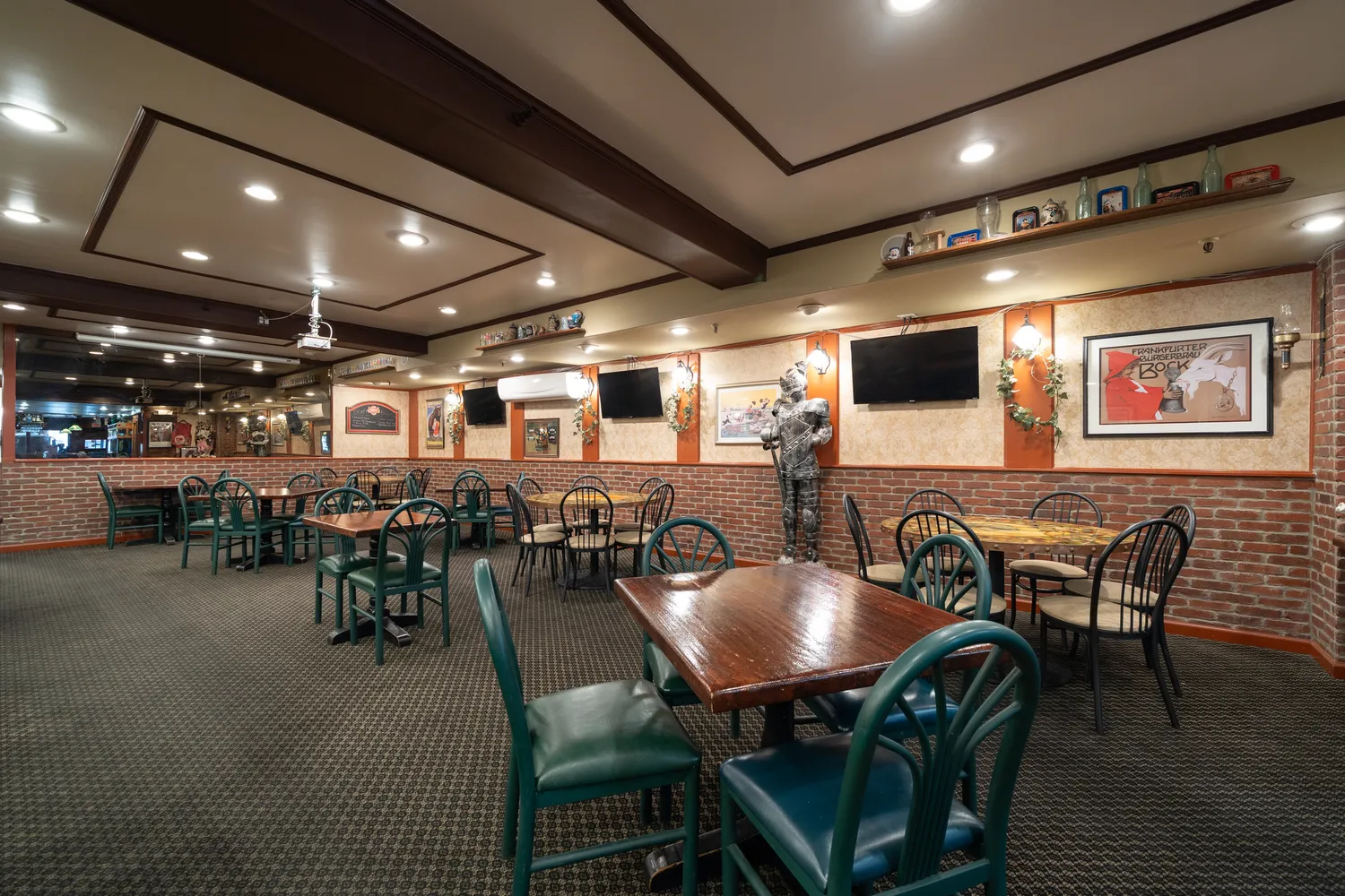 a view of staircase with lots of frames on wall and deck
