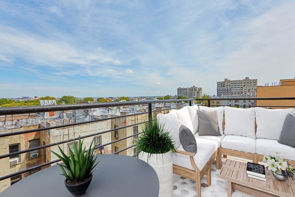 341 Eastern Parkway, Unit 8D Brooklyn, NY 11216 - Photo 1 of 7 a view of a balcony with chairs