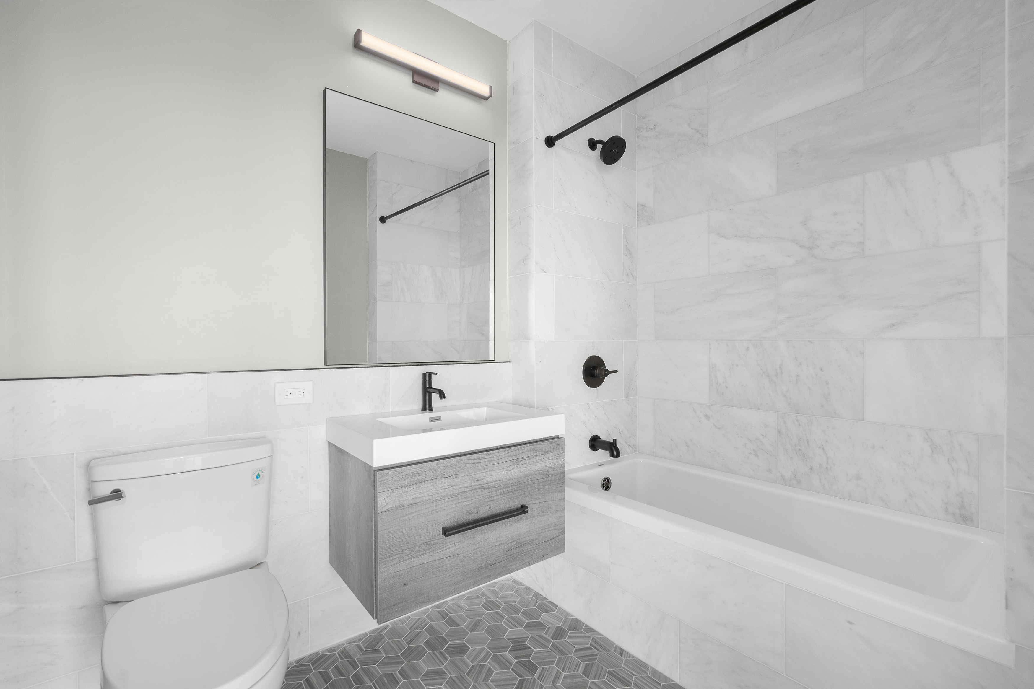 927 Atlantic Avenue, Unit 7A Brooklyn, NY 11238 - Photo 10 of 16 a bathroom with a sink a toilet and shower