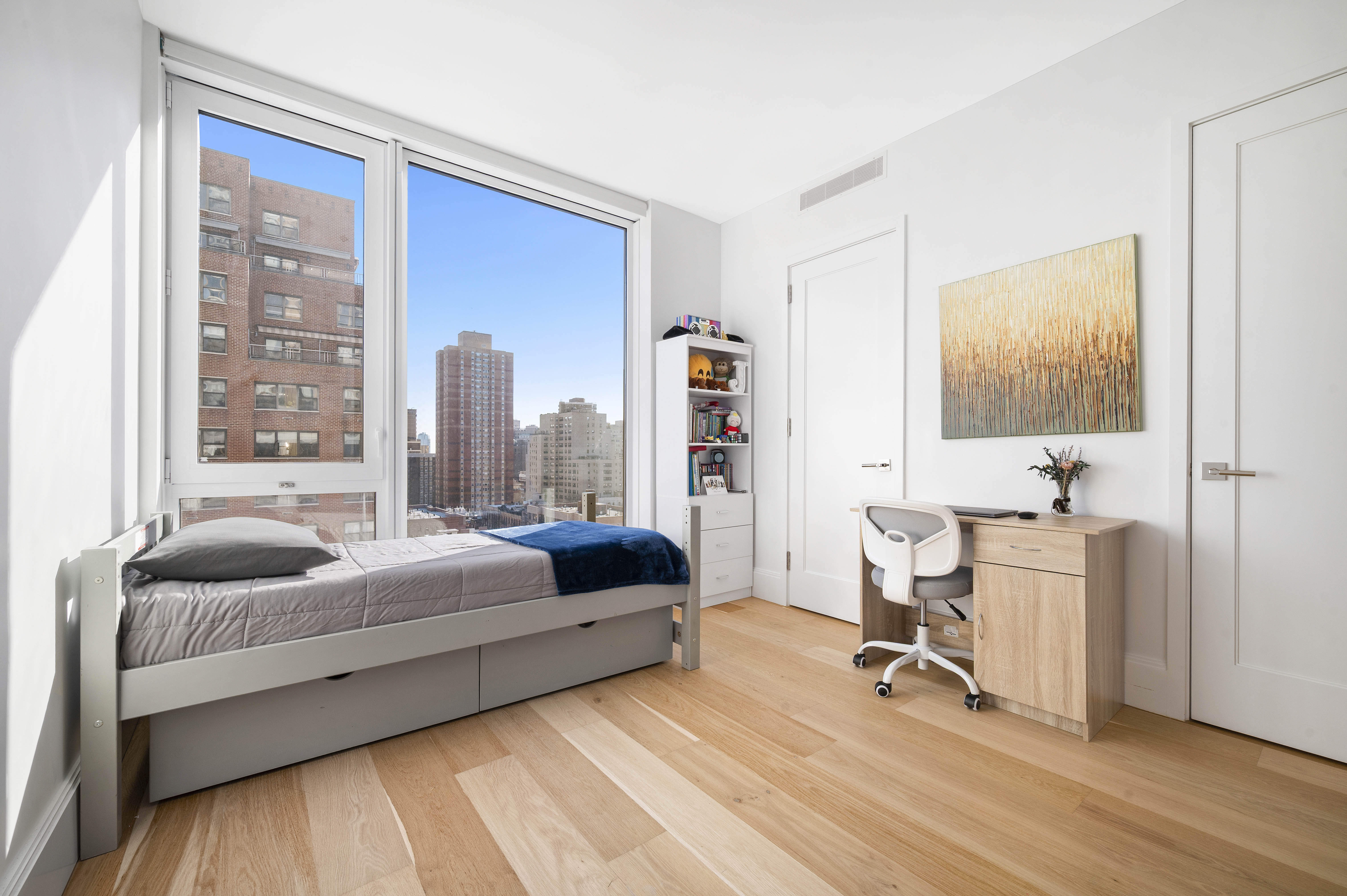 368 3rd Avenue, Unit 11A Manhattan, NY 10016 - Photo 7 of 17 a living room with furniture and a large window